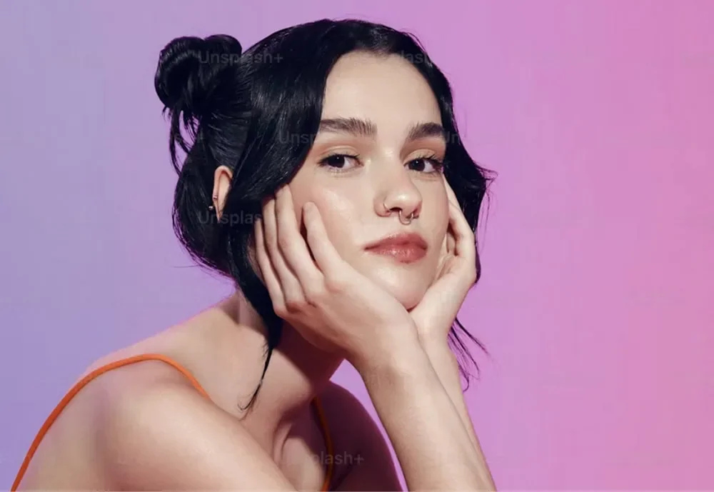 woman looking at camera considering business financing options in Alberta