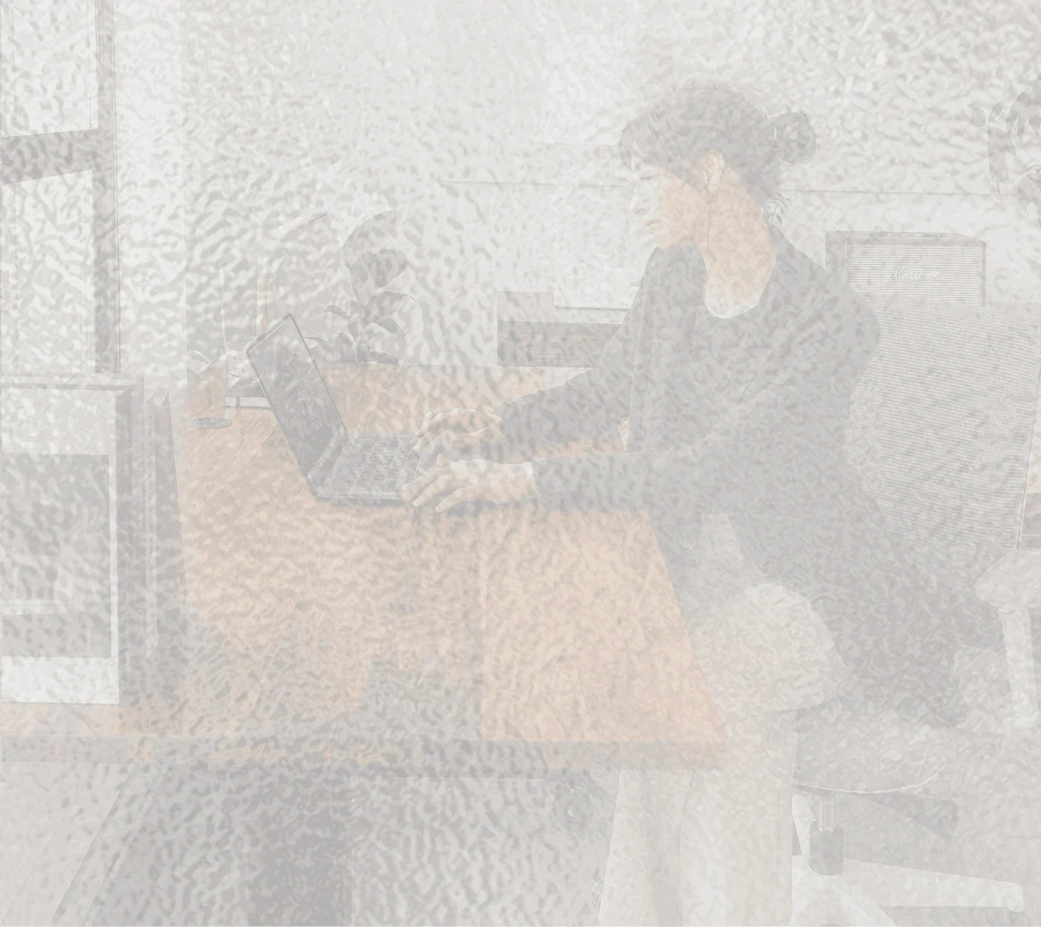 woman working on laptop receiving advisor led business support