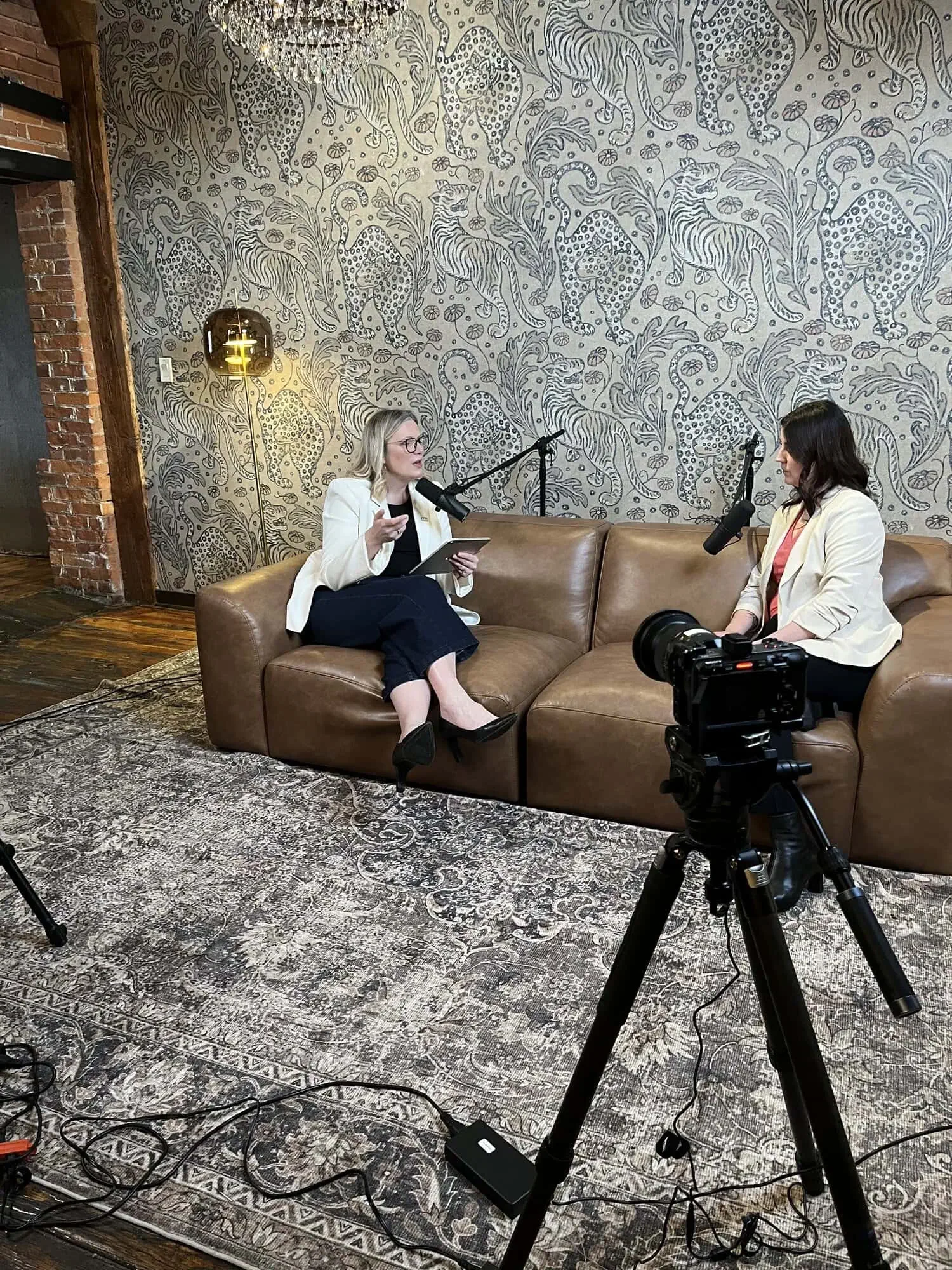 2 women during a podcast interview for Alberta Women Entrepeneurs Podcast