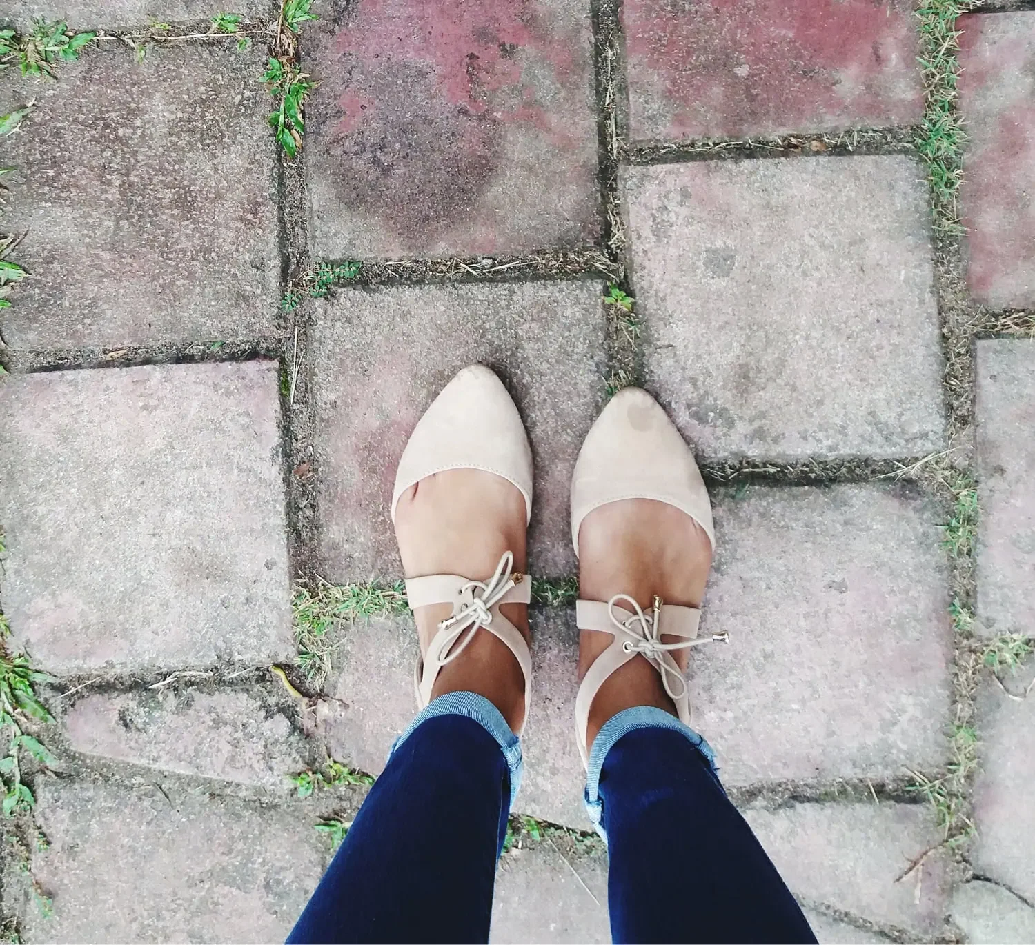 eet standing on path tiles representing a clear path forward in business planning