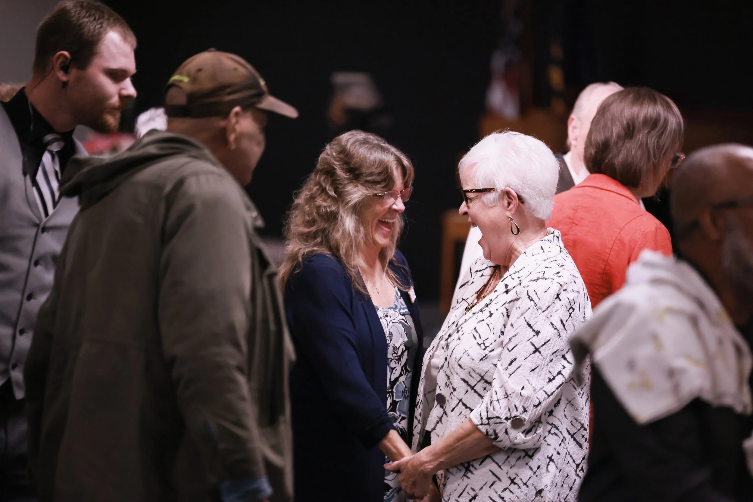 Greeting Elder Cathy Shirley smiling (1).JPG