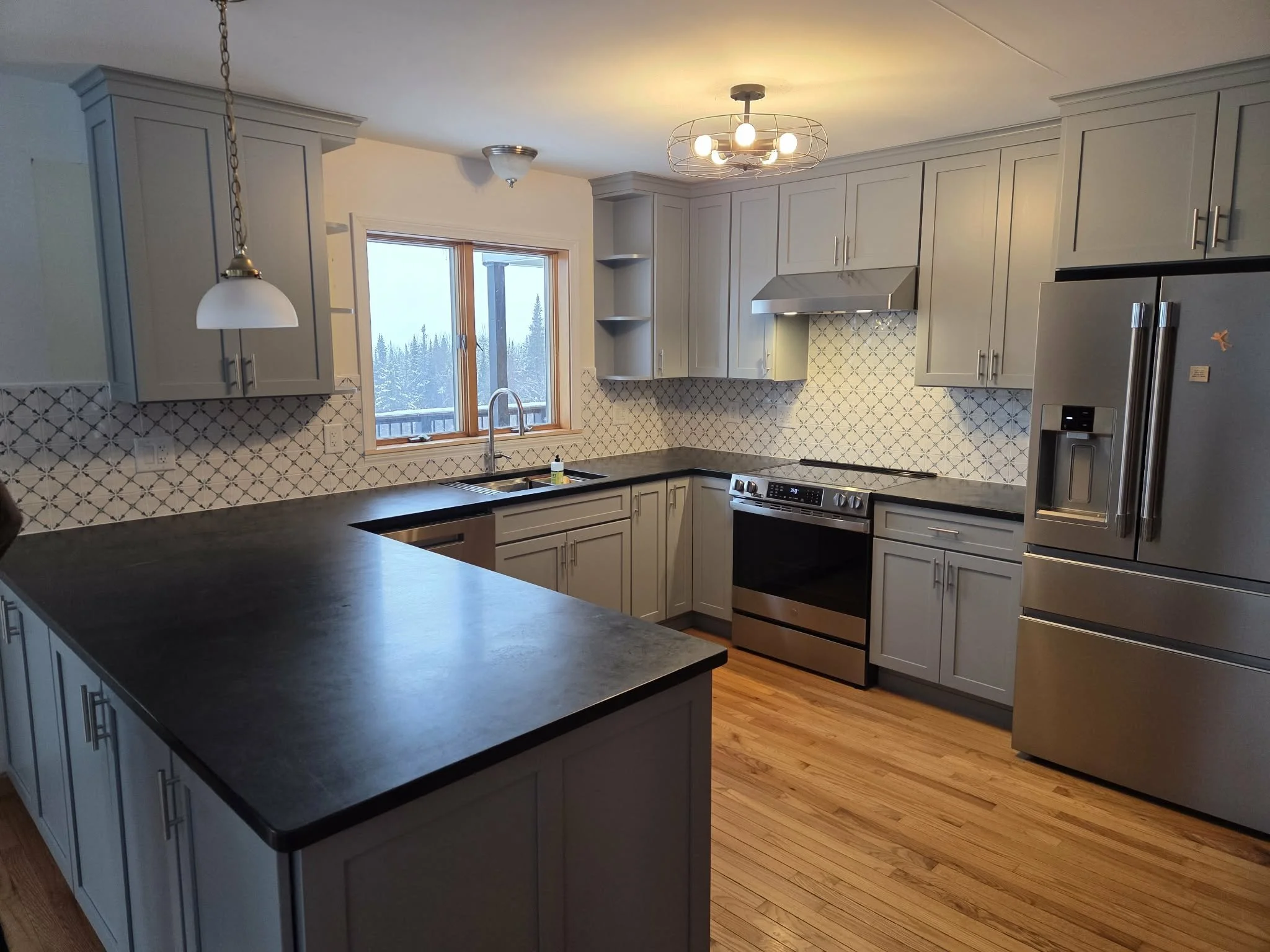 Kitchen renovation, new cabinets, tile backsplash.  New deck, larger deck, fiberon composite decking, avalon aluminum railing with drink rail, dryspace