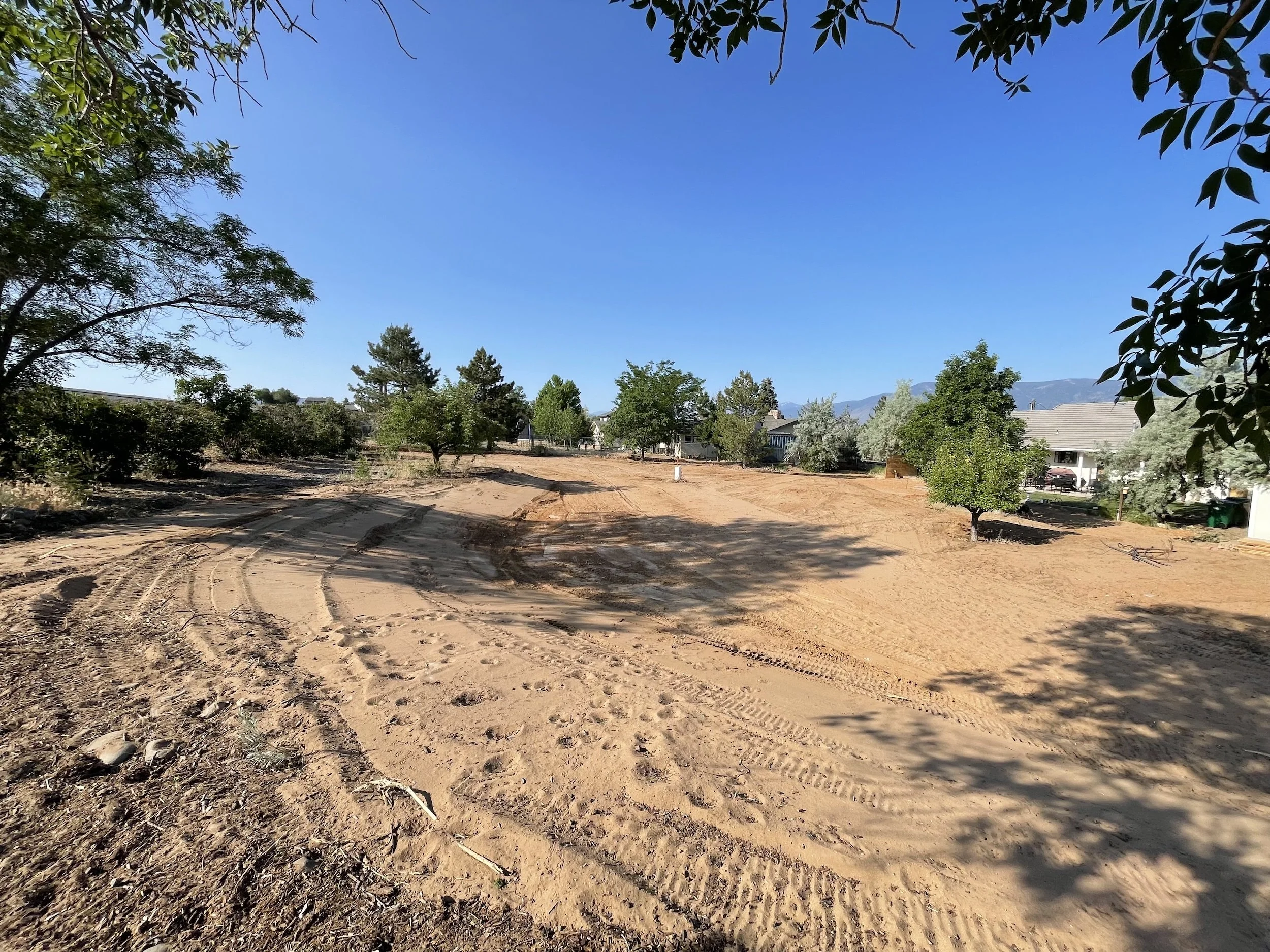 Wide graded lot ready for construction