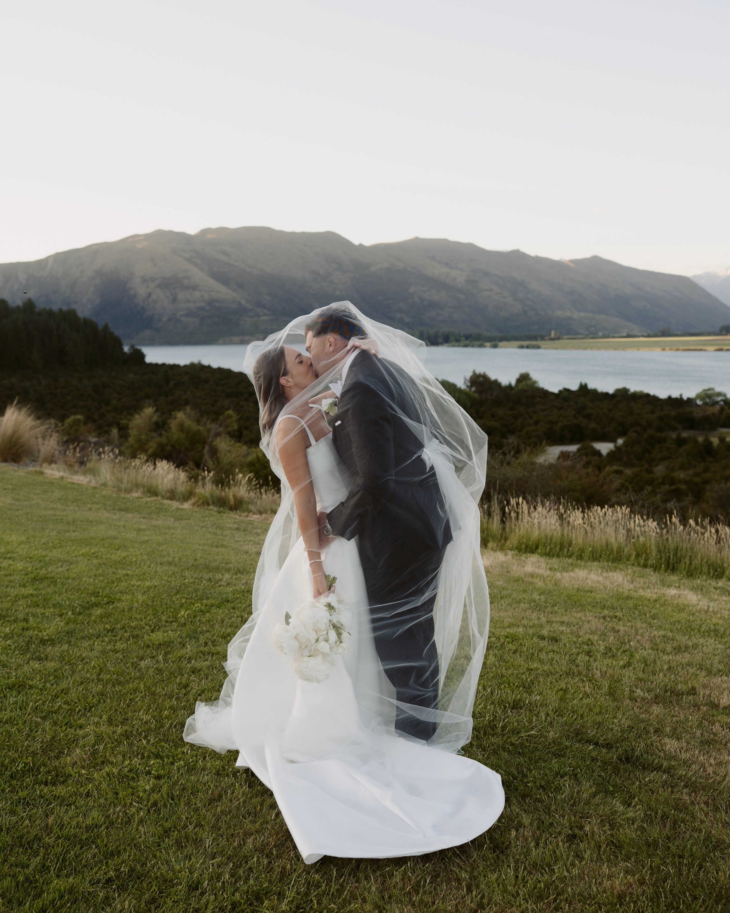 Lucy &amp; David Pt. 1 // Set against the picturesque backdrop of Dublin Bay in Wānaka, the Havillis gathered with their nearest and dearest for an intimate celebration of their marriage.

Captured by @katerobergephotography
Bride @lucyhavili
