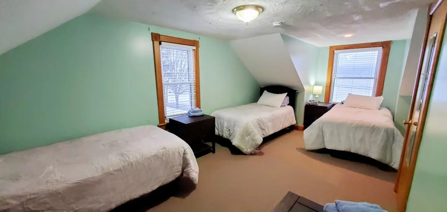 Bedroom 3 with three single beds