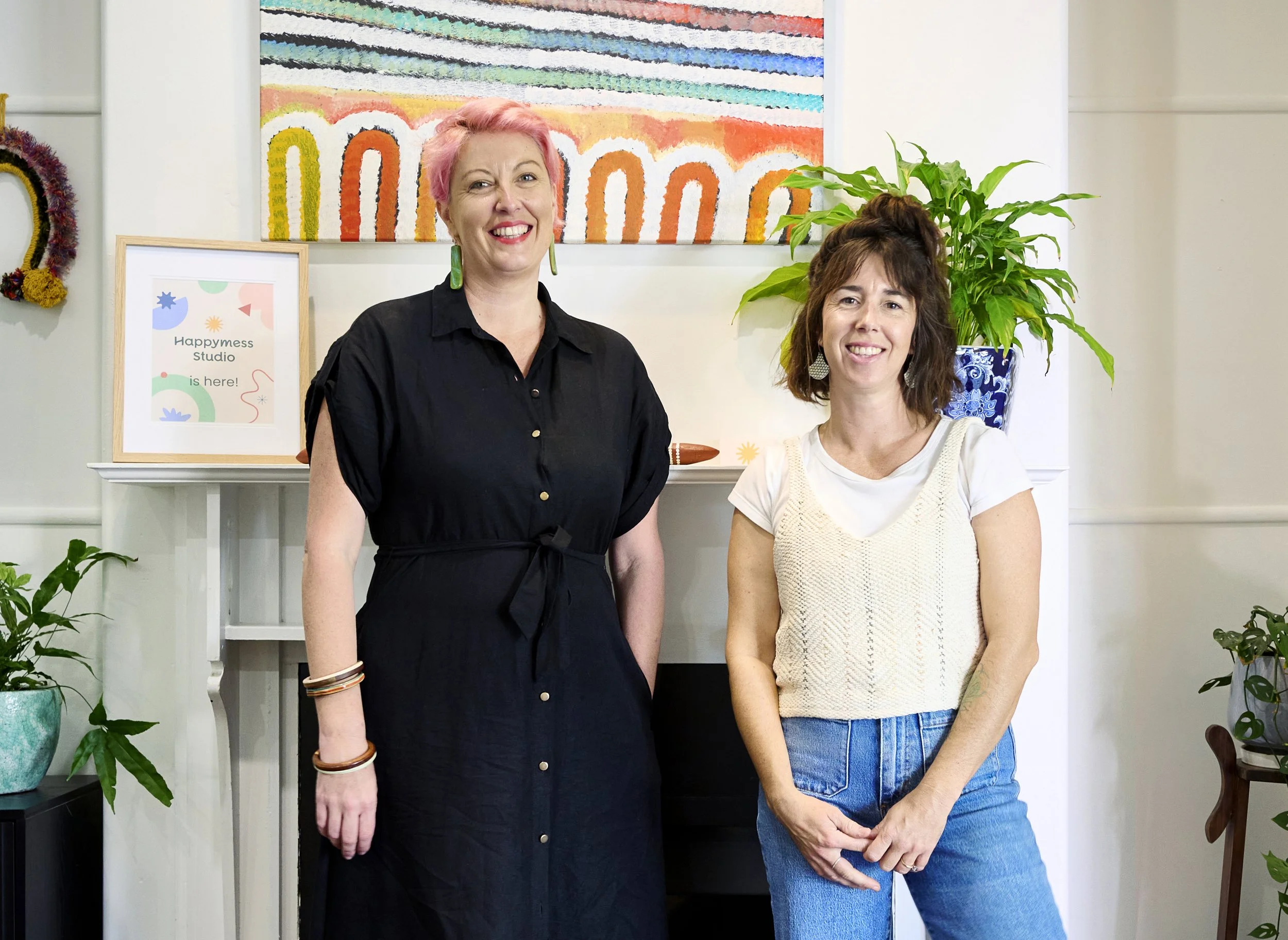 Bronwyn & Miranda from Happymess Studio, smiling at the camera in their Bellingen Studio