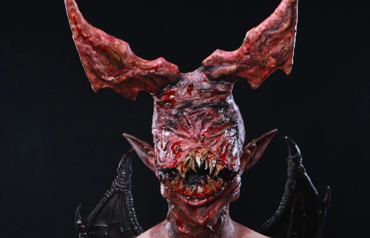 
I designed and created a demon foam prosthetic by sculpting and molding a casted face, then filling it with foam. Next, I colored the foam prosthetic and affixed custom-made teeth and ears.