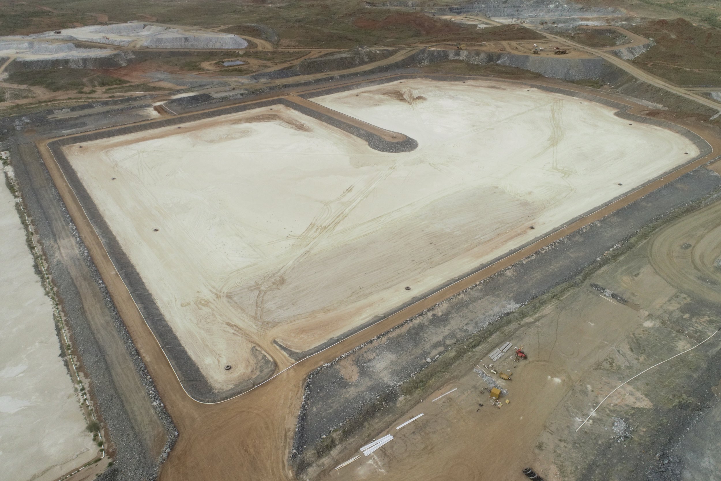 DAM CONSTRUCTION & RAISES — Rapid Crushing & Screening Contractors PTY LTD