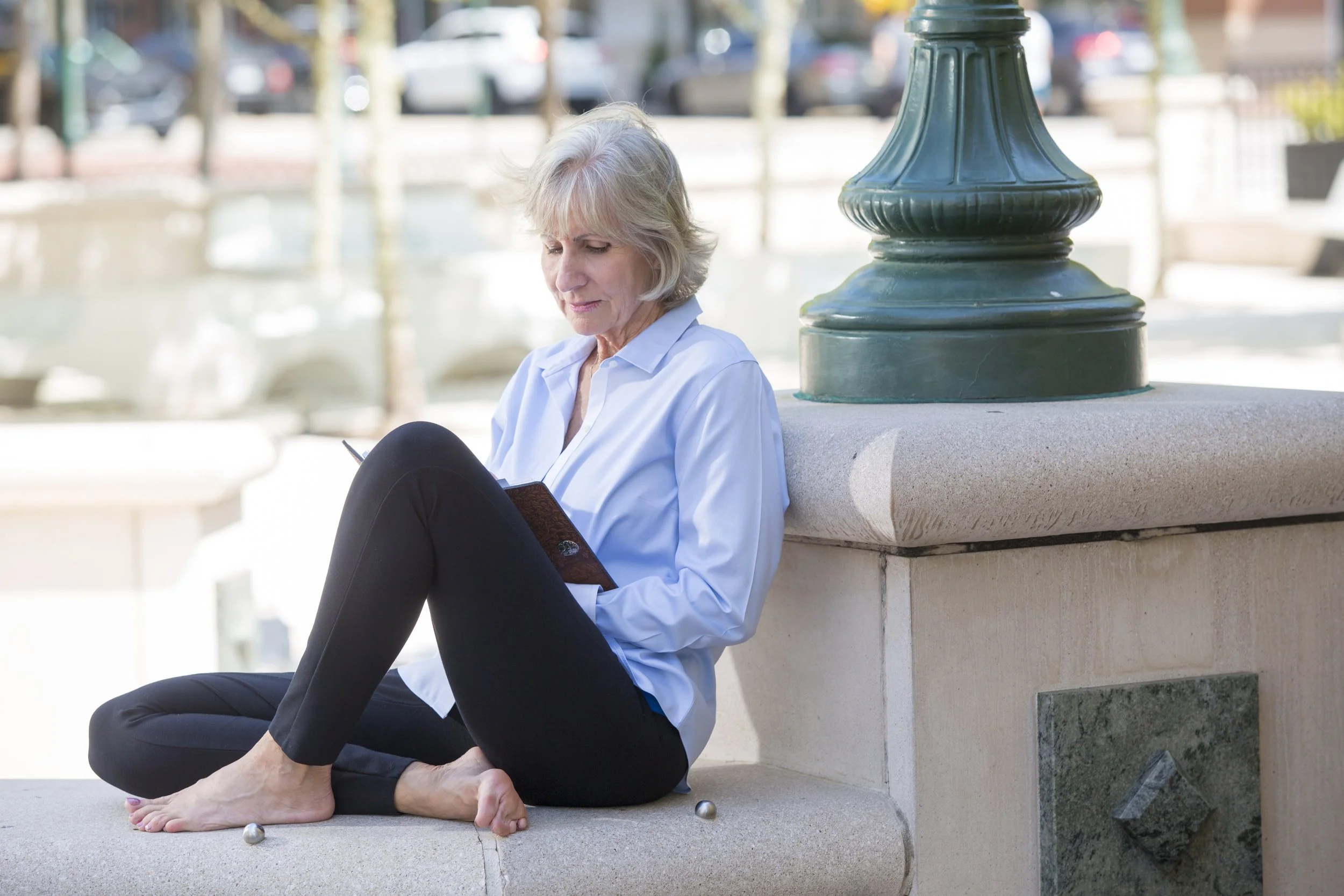 Terry sitting reading a book
