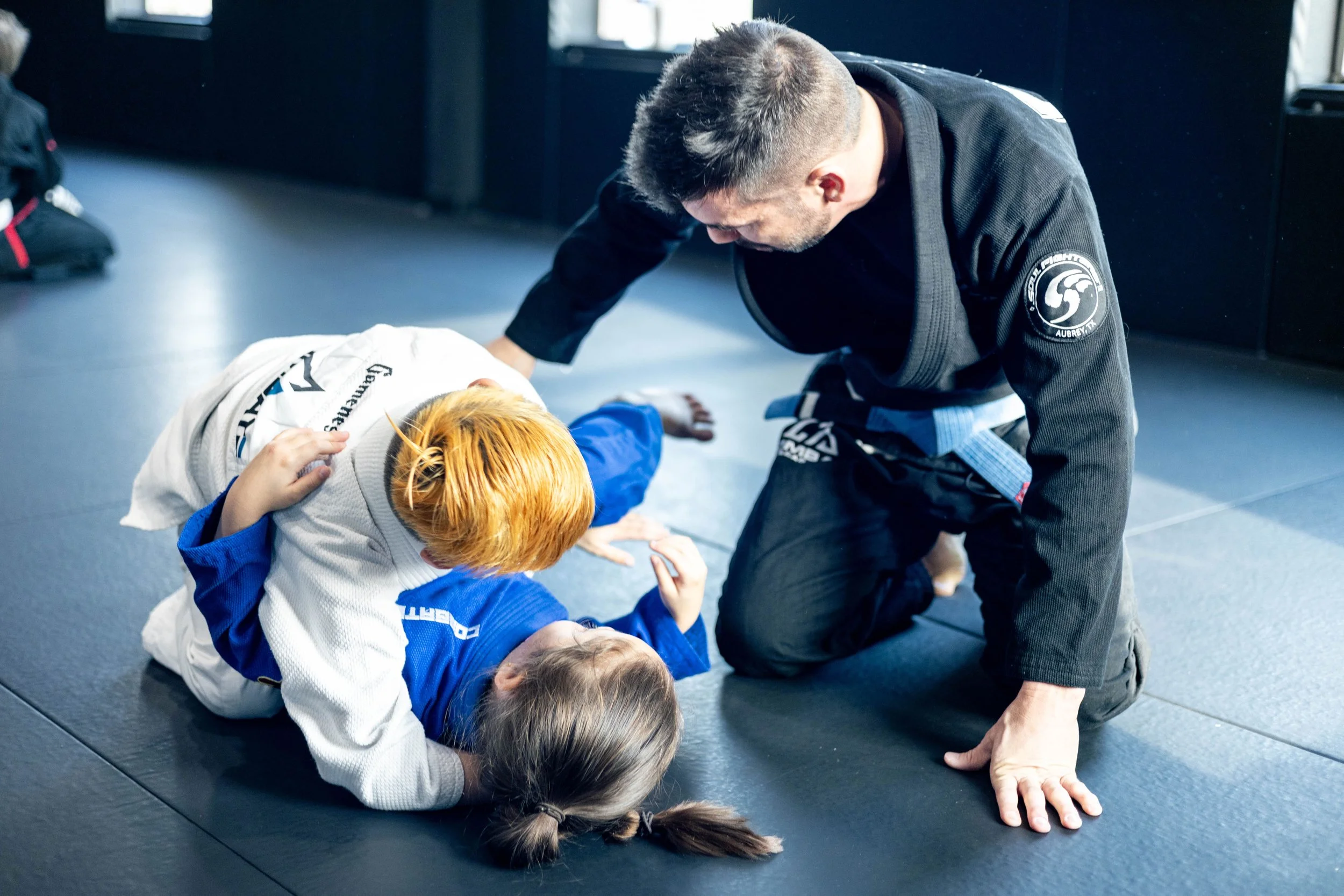 Daniel Motta Coaching Kids at Combate