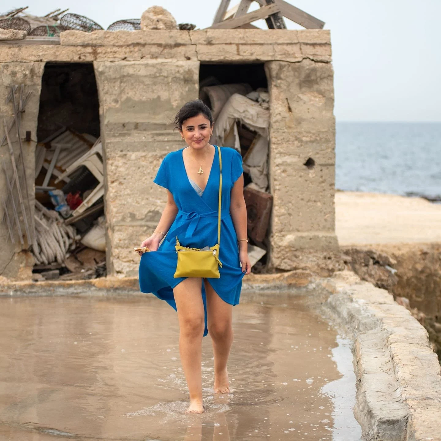 Reporting on traditional salt craftsmanship in Anfeh's historic salines, Lebanon