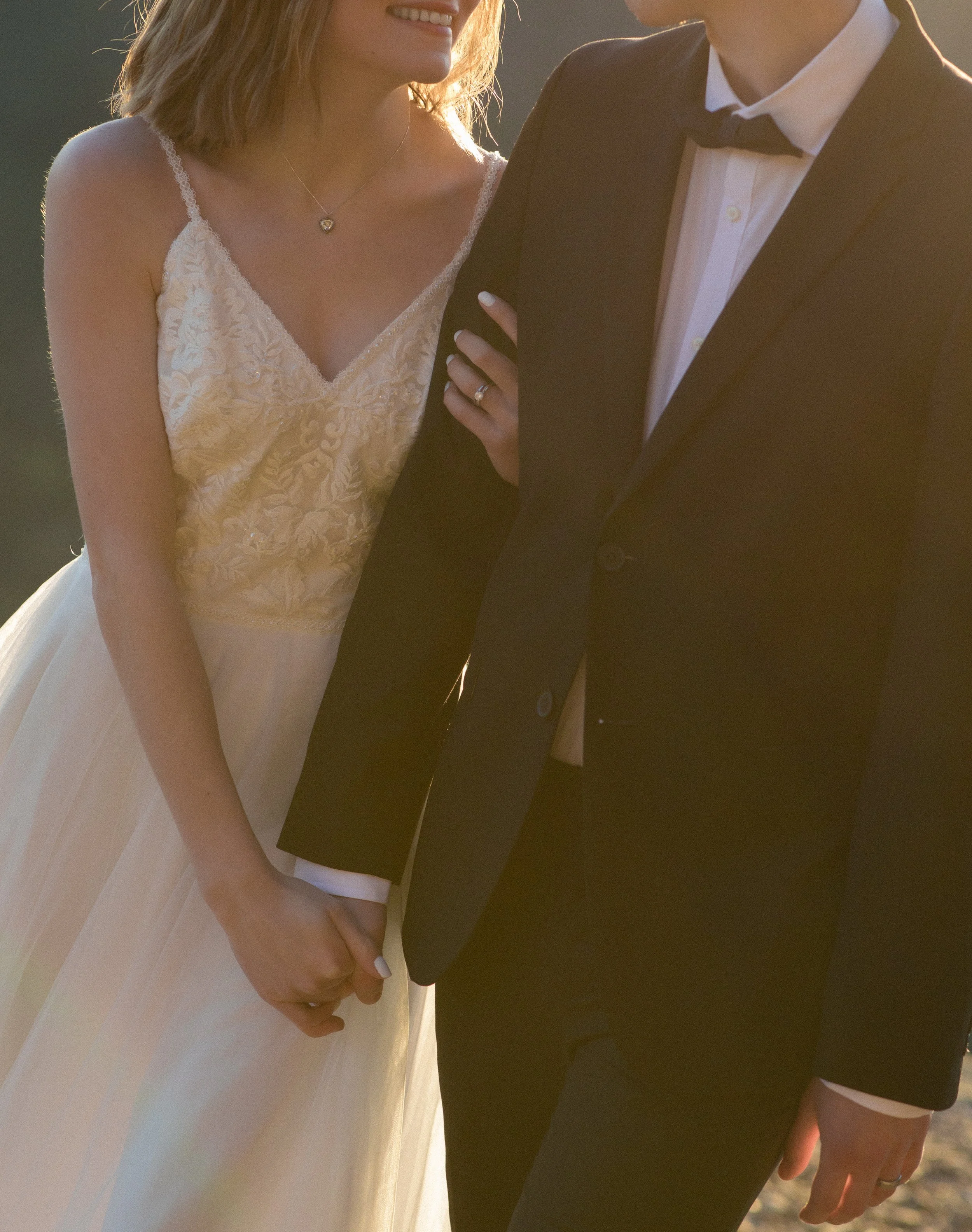 Oregon coast elopement timeline sunset couple walking