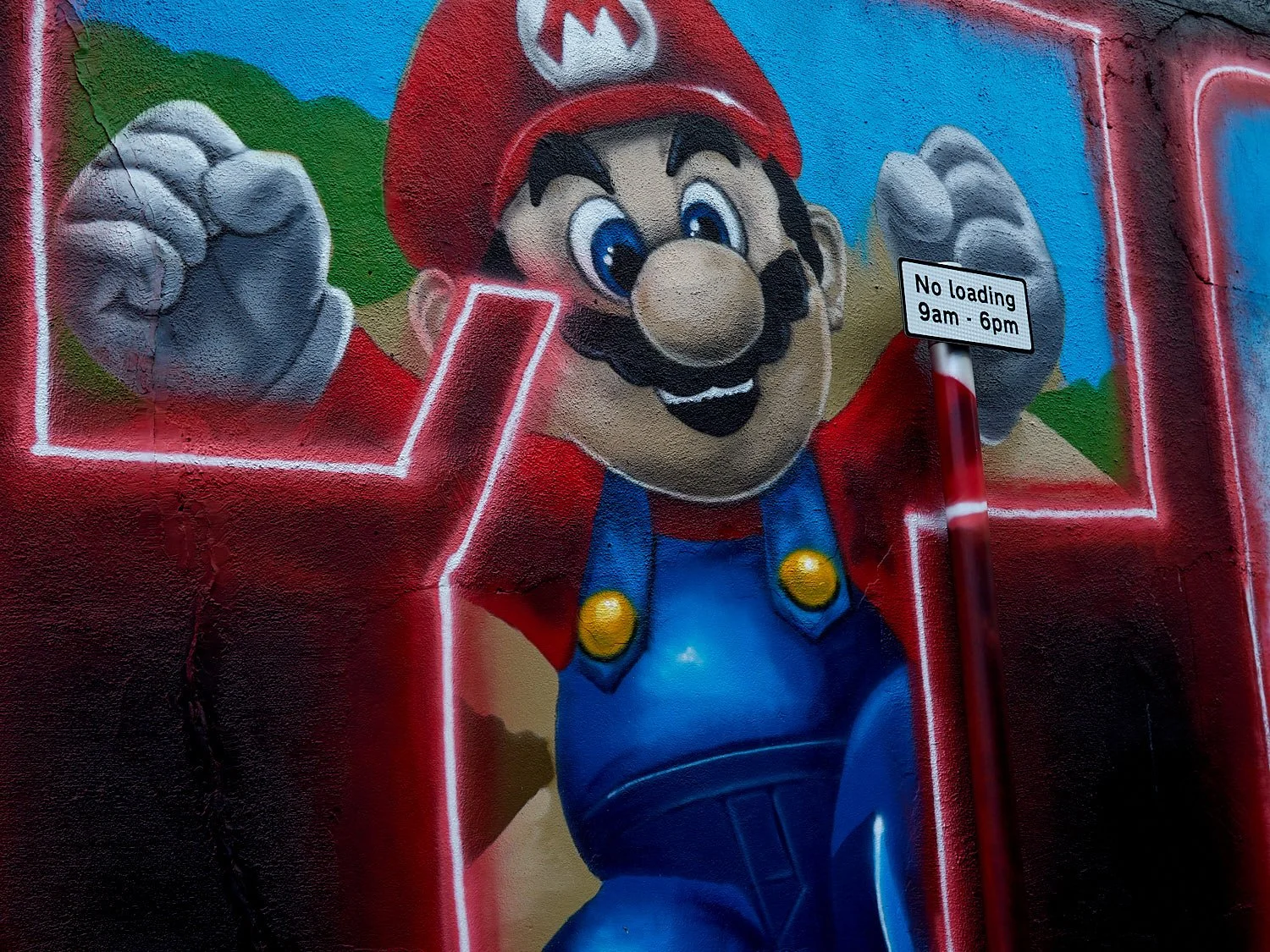 Is there a message? No idea – but the airbrushing on the post shows the art came after the sign.