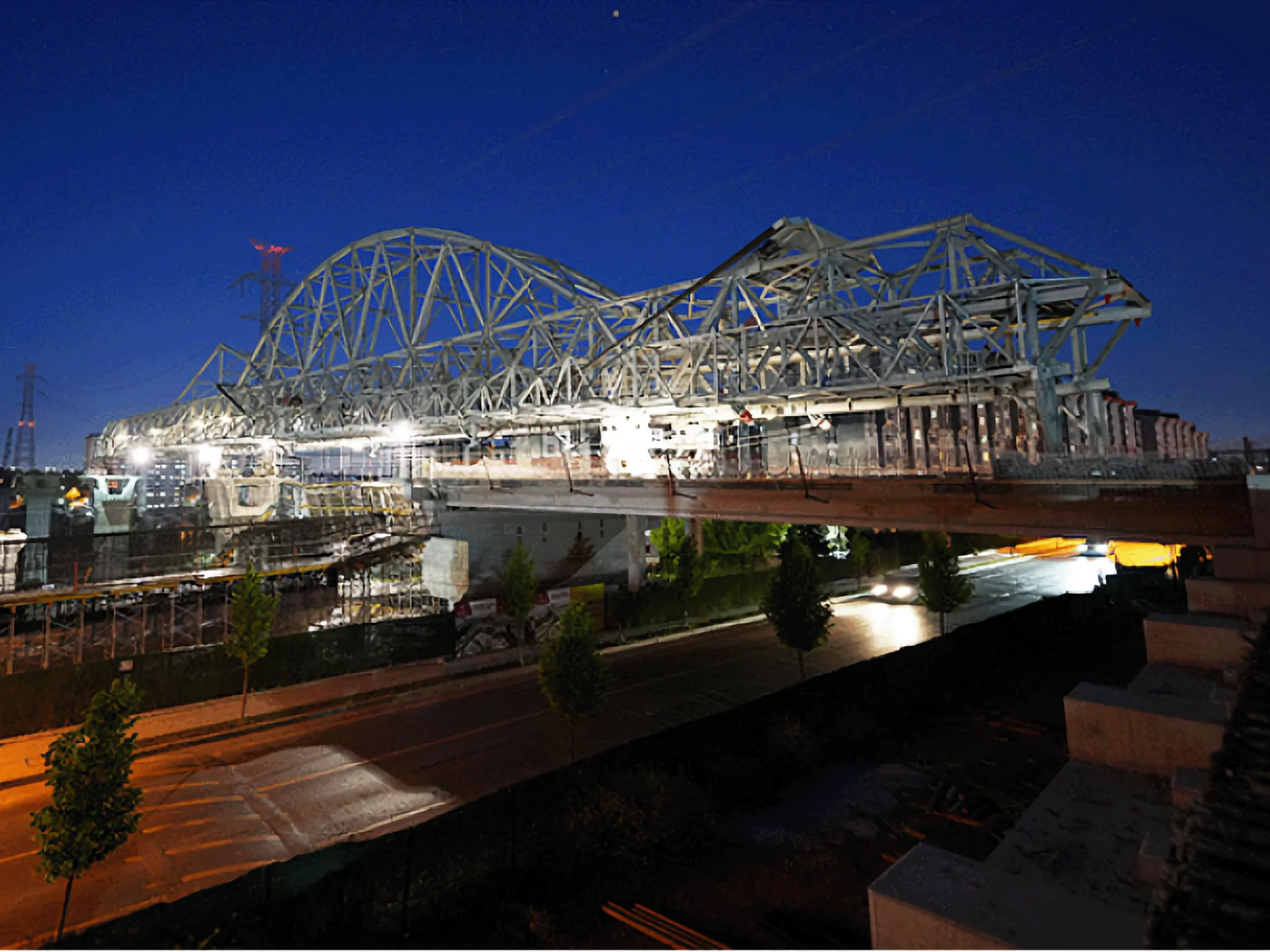 Autonomous surveying robot with camera and GPS, alongside mapped aerial view of a residential area showing surveyed paths in blue and red.