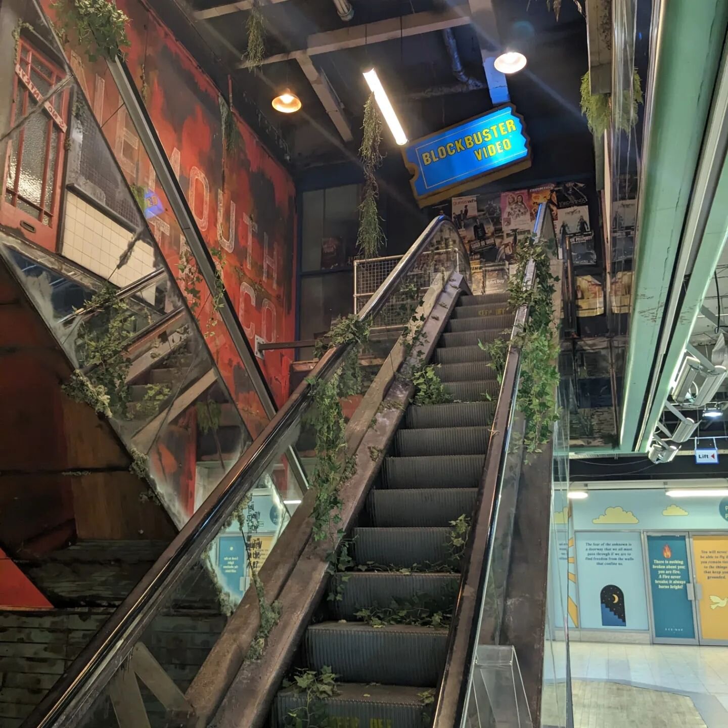 Love this shopping centre regeneration escalator feature in Bournemouth, created by @thesyruproom - especially the nostalgic blockbuster sign! 

#nostalgiadesign #regenerationdesign #interiordesign