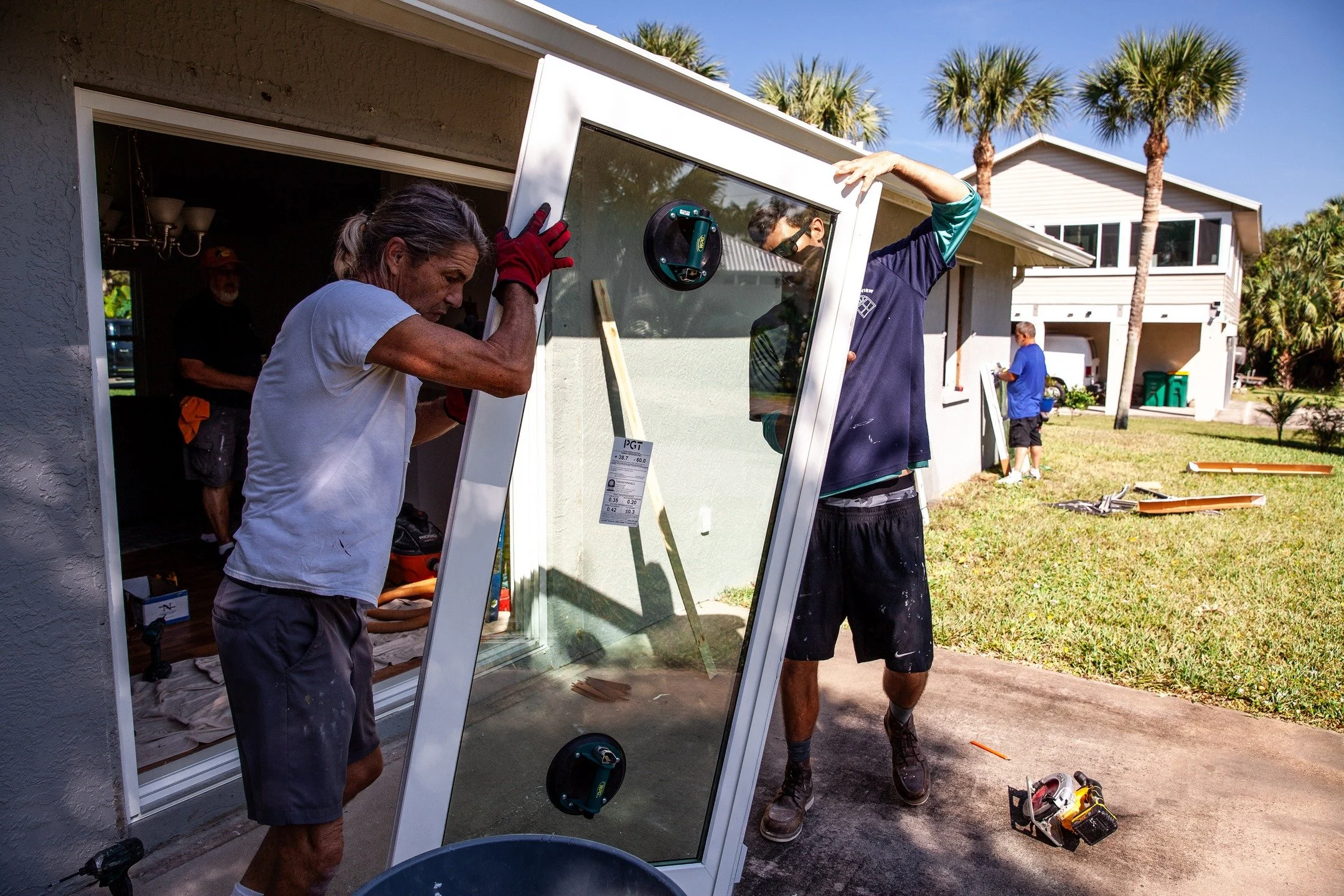 It takes a village to raise a child and a sharp crew to install windows and doors.