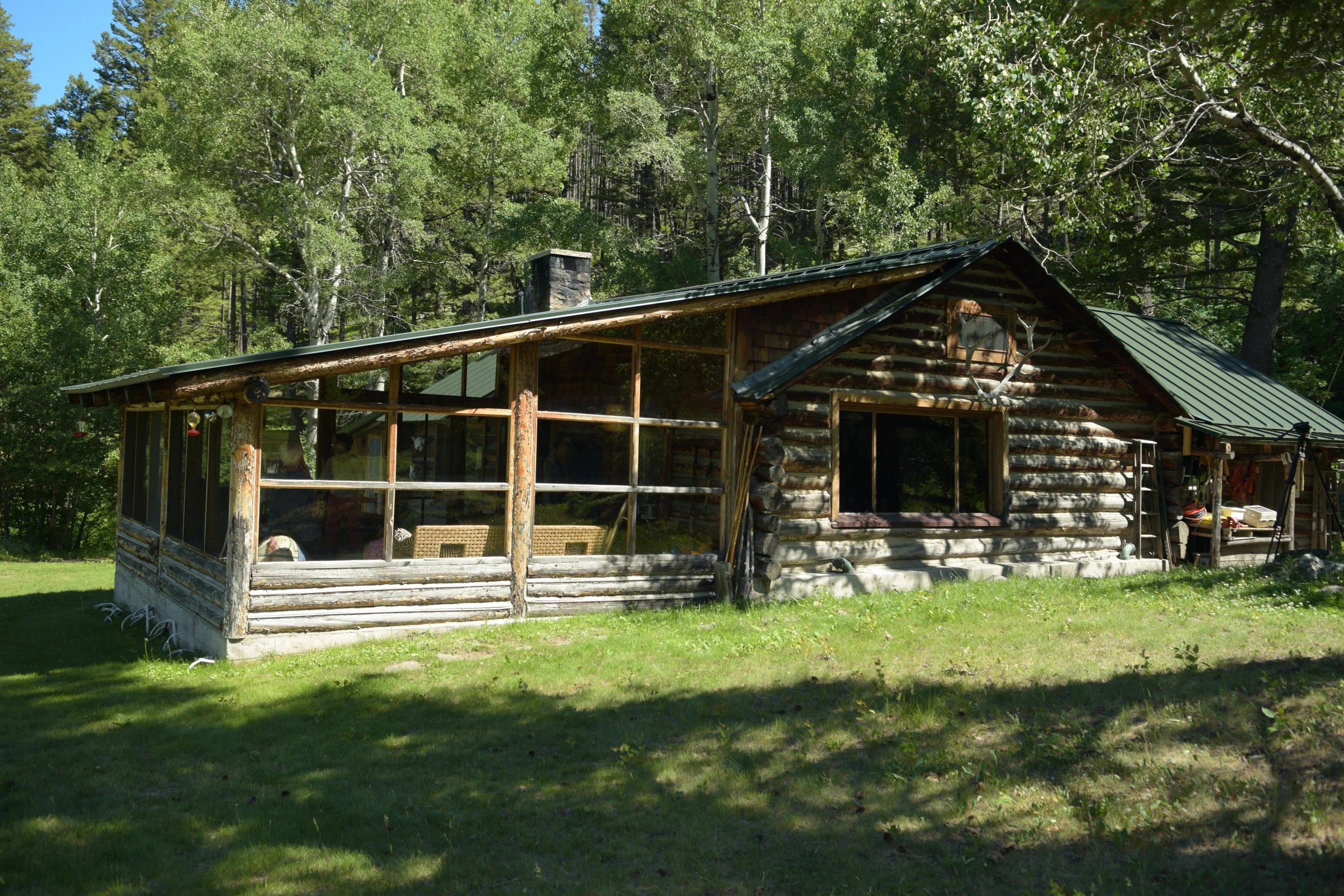Replace rotting lower log at base of dining room window: $5000