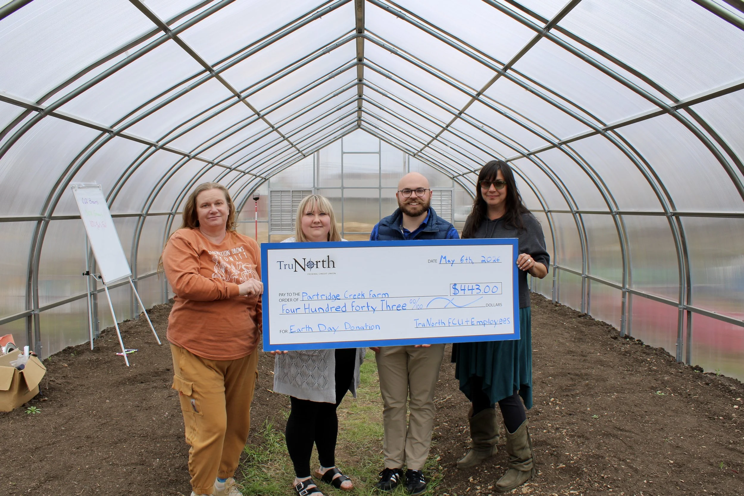 TruNorth Generously Donates In Support of Partridge Creek Farm’s Mission in Ishpeming