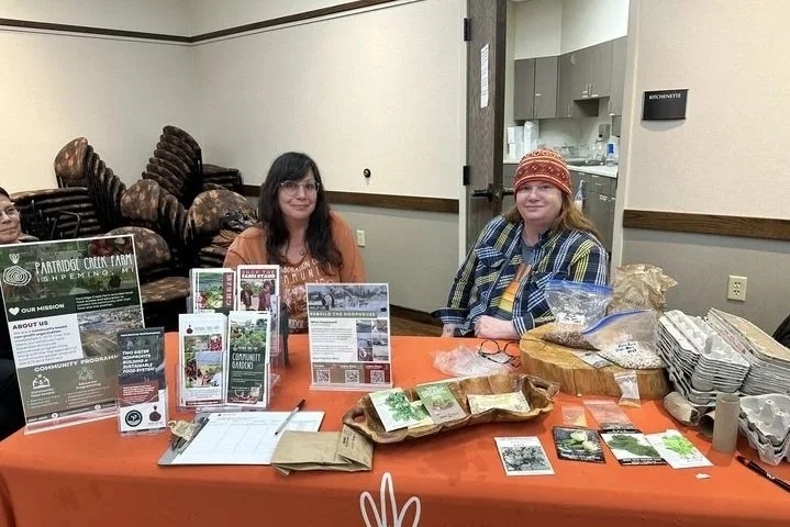 Partridge Creek Farm staff at the 2026 Queen City Seed Library Seed Swap