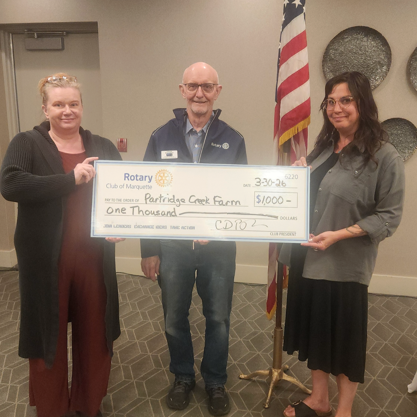 The Rotary Club of Marquette Makes a Generous Donation to Support the Partridge Creek Farm Garden at Ishpeming Middle School