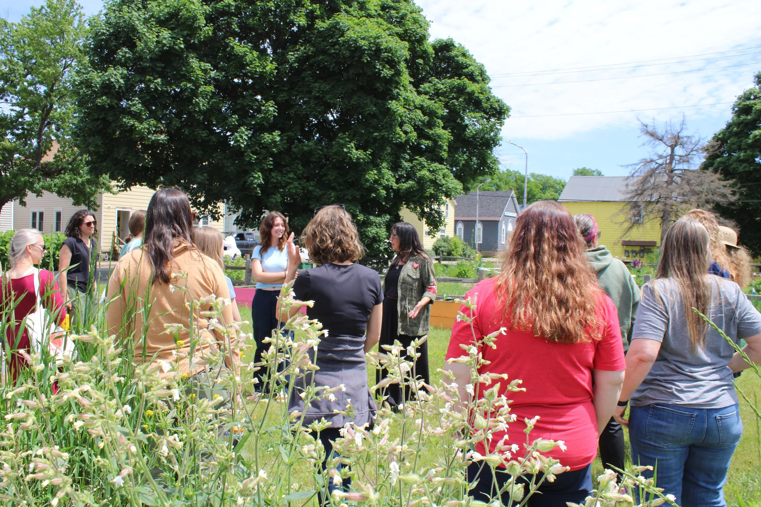 2024 Farm-to-School Institute attendees in the Partridge Creek Farm Ishpeming Middle School Garden