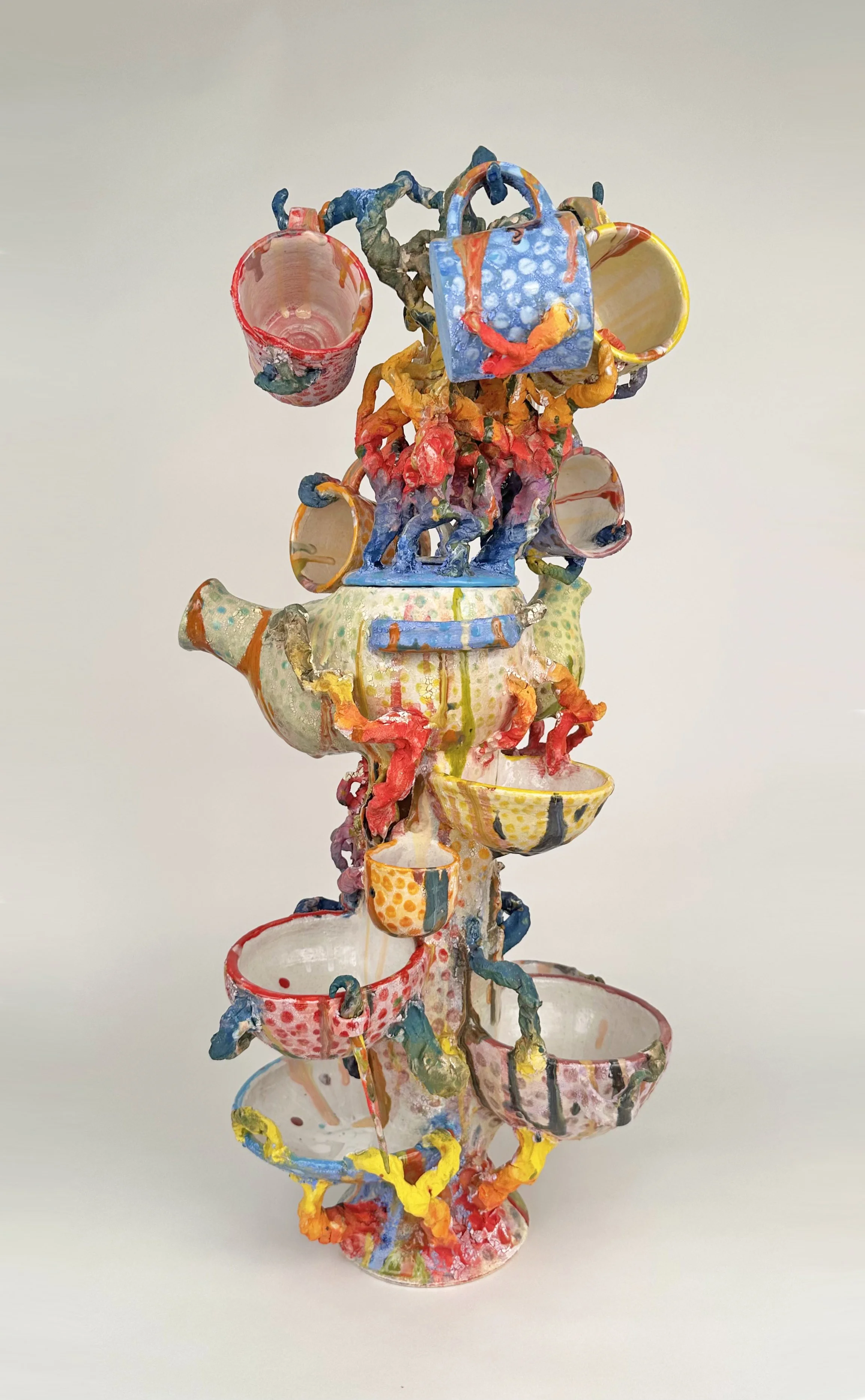 Title: Bacchus Set
Pieces: Seven bowls, two vases, six mugs and champagne cooler with lid.
Date: 2025
Dimensions:  14 x 13 x 32 in.
Materials: Glazed Stoneware