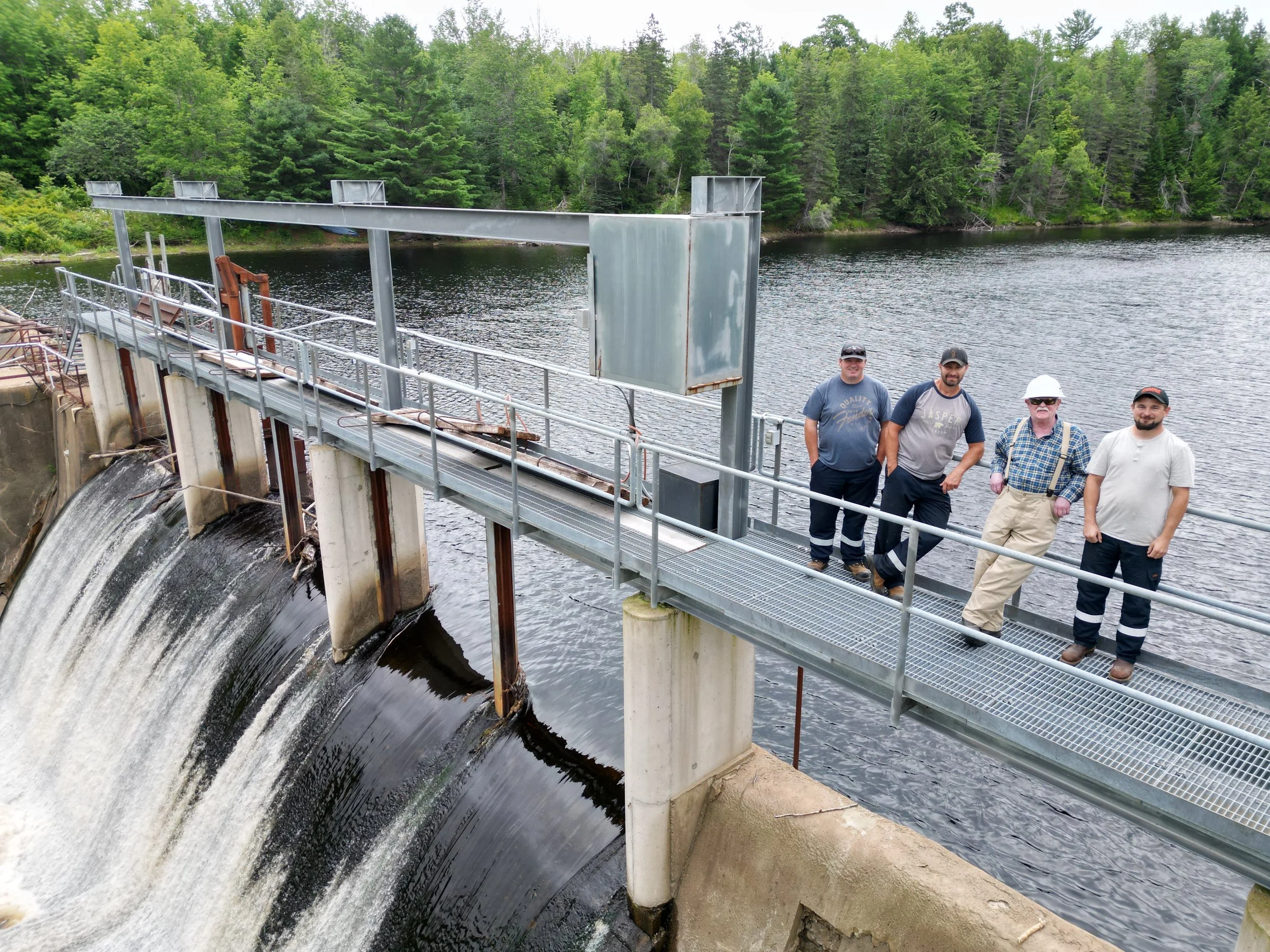Berwick Electric Commission crew and Don Regan on the Factorydale Dam walkway