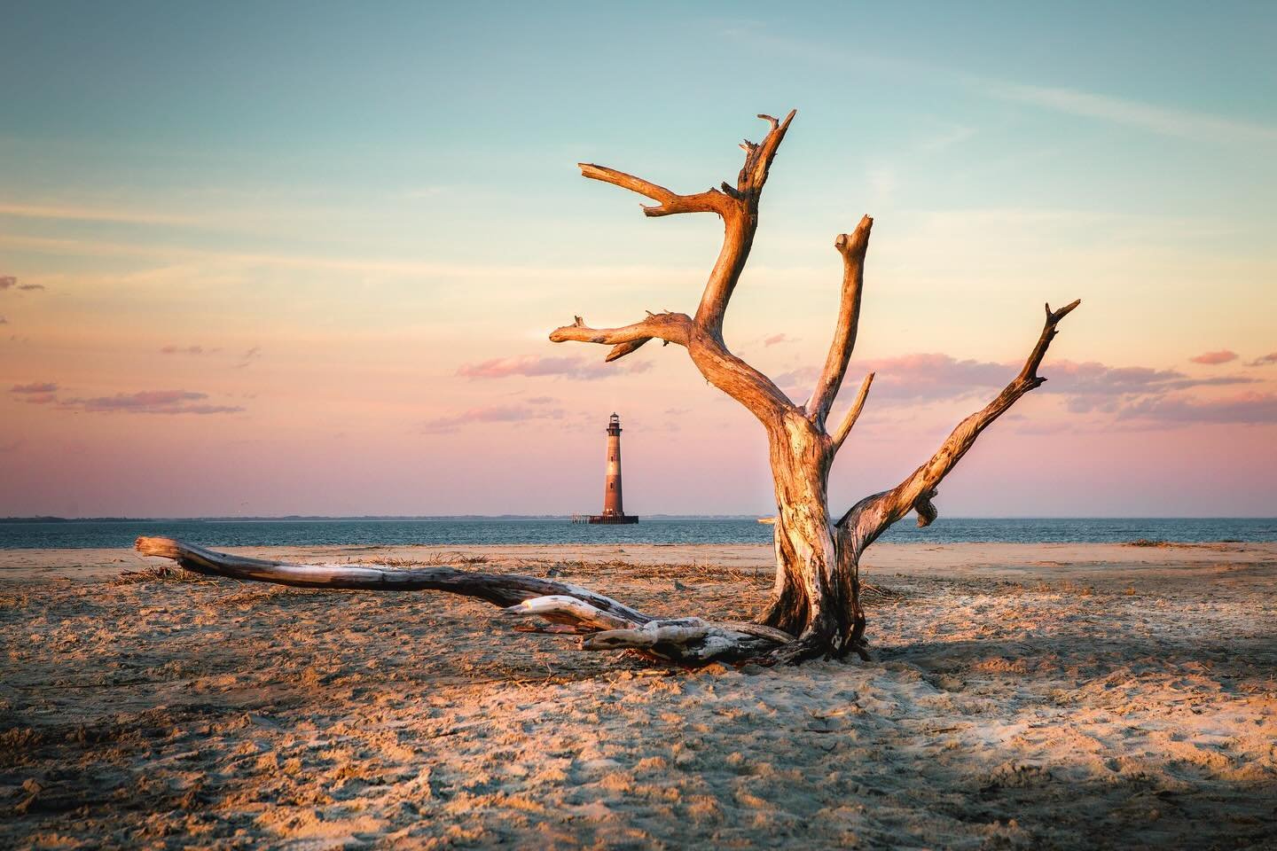 First lit in 1767. Decommissioned in 1962. The Morris Island Lighthouse towers 161 ft high at the entrance to Charleston Harbor and is the tallest lighthouse in South Carolina. Once standing proudly on land about 1,200 feet from shore, she finally su