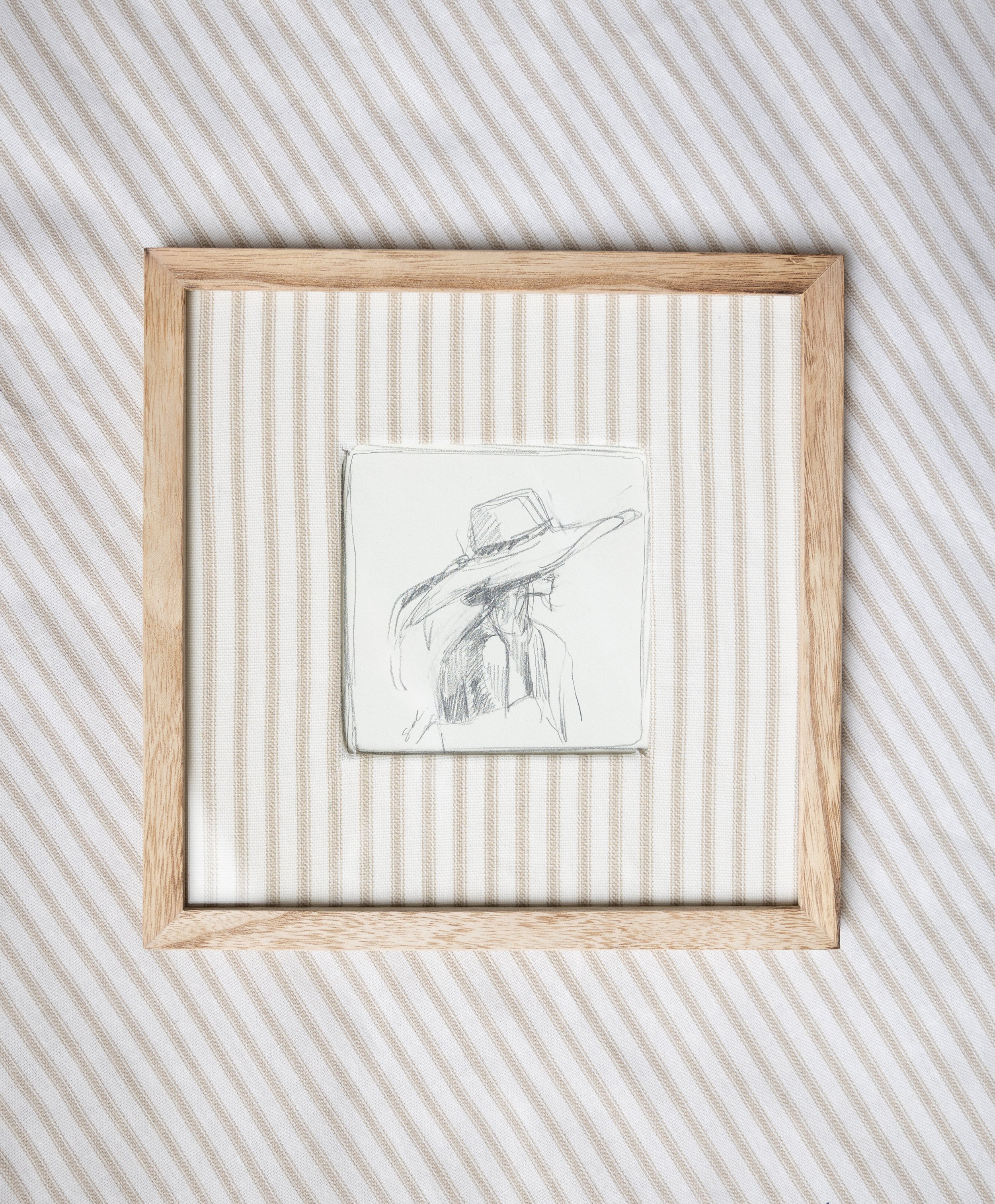 Framed Woman in a Hat