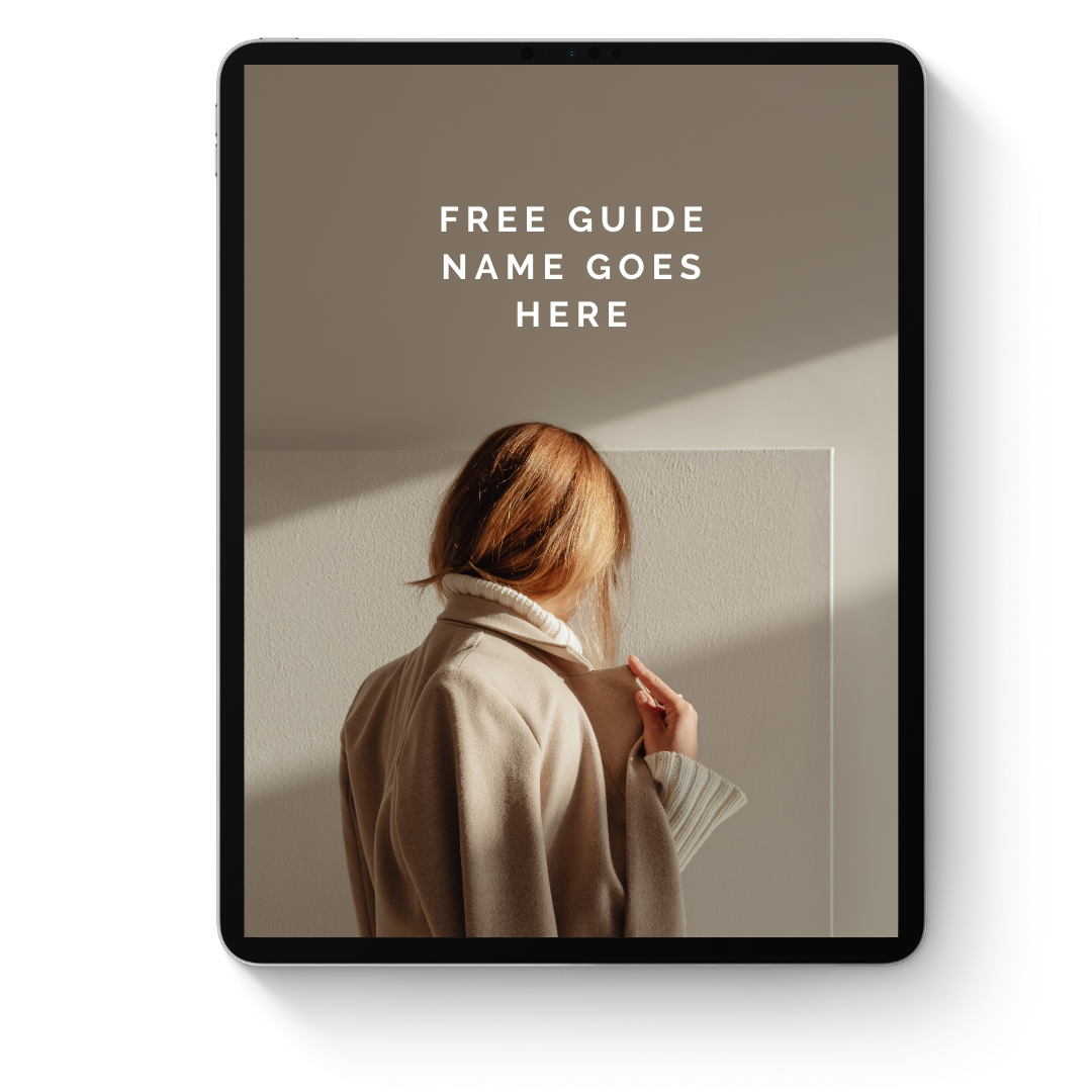 A woman with blond hair wearing a beige coat and white sweater, holding her coat collar, looking at a white wall with sunlight casting shadows. Text on the image reads 'FREE GUIDE NAME GOES HERE.'