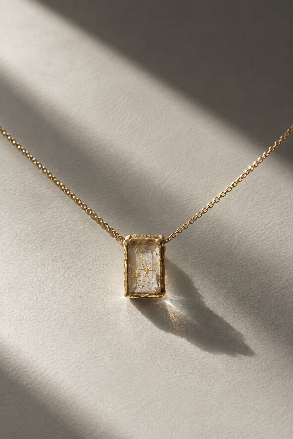Studio-IRIS-tremor-lux-14kt-gold-rutilequartz.png