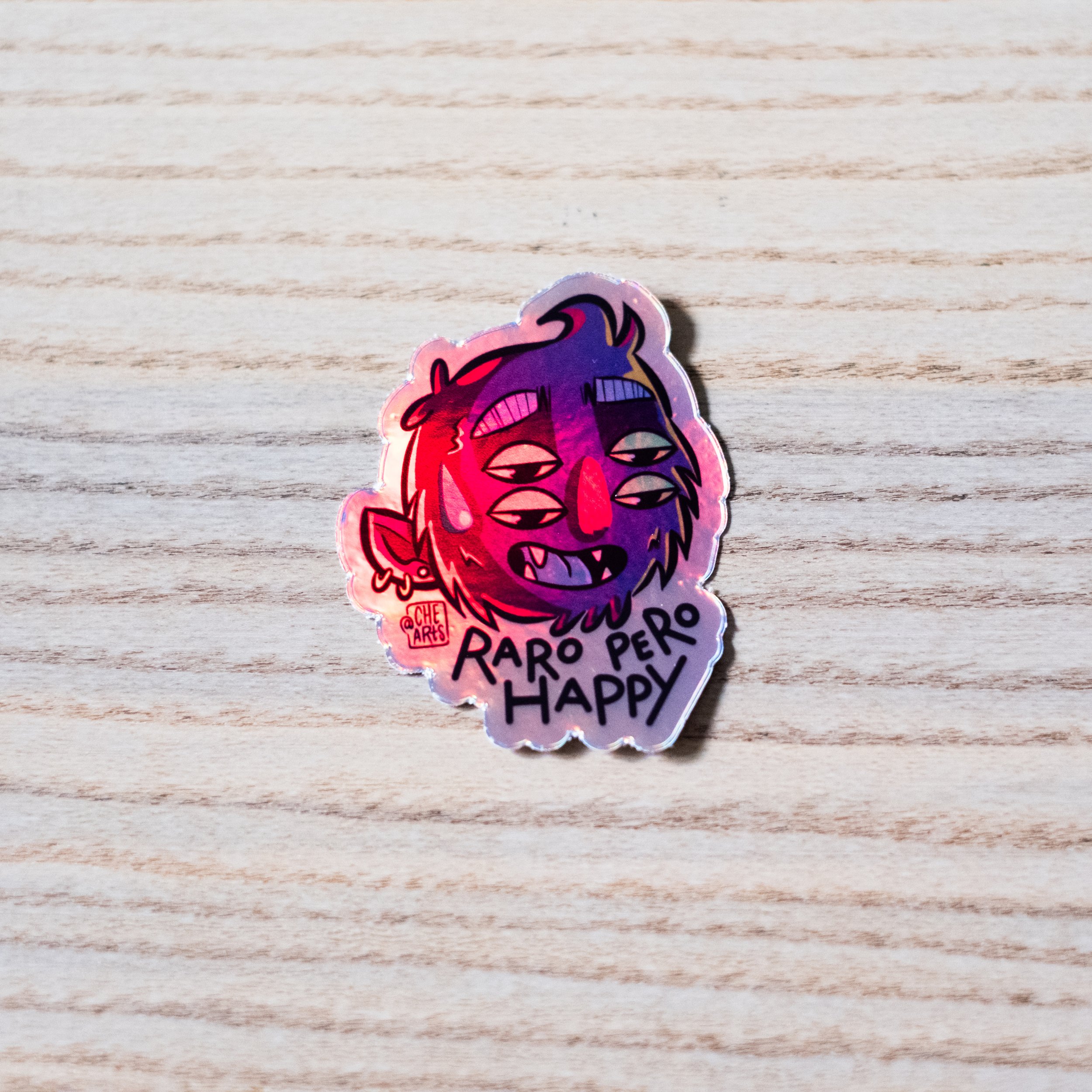 Sticker tornasol "Raro pero happy"