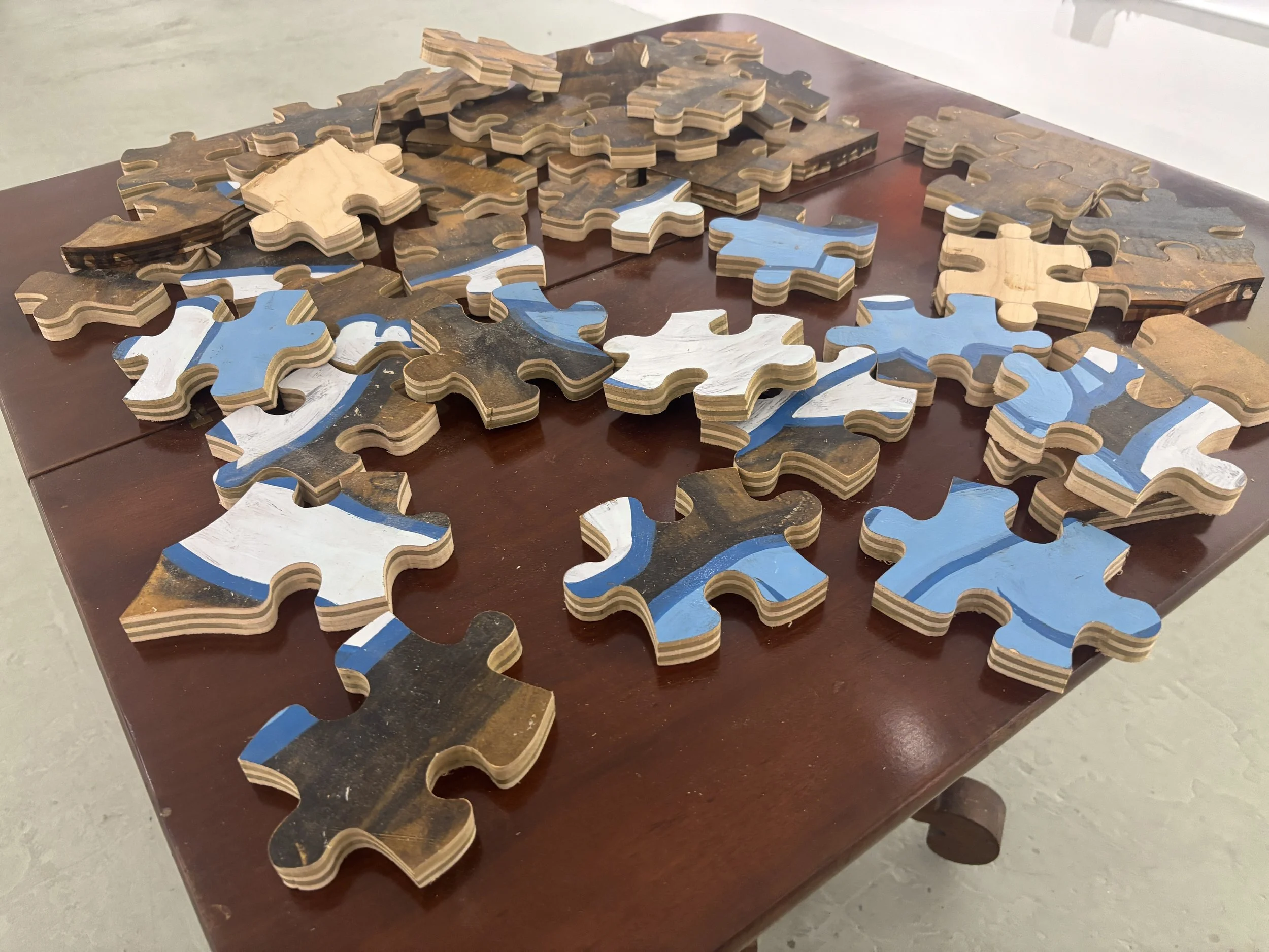 19. "What's left of Webelo"
shellac, charcaol and Rustoleum on birch veneer plywood, jigsawed into puzzle
pieces
$100 each