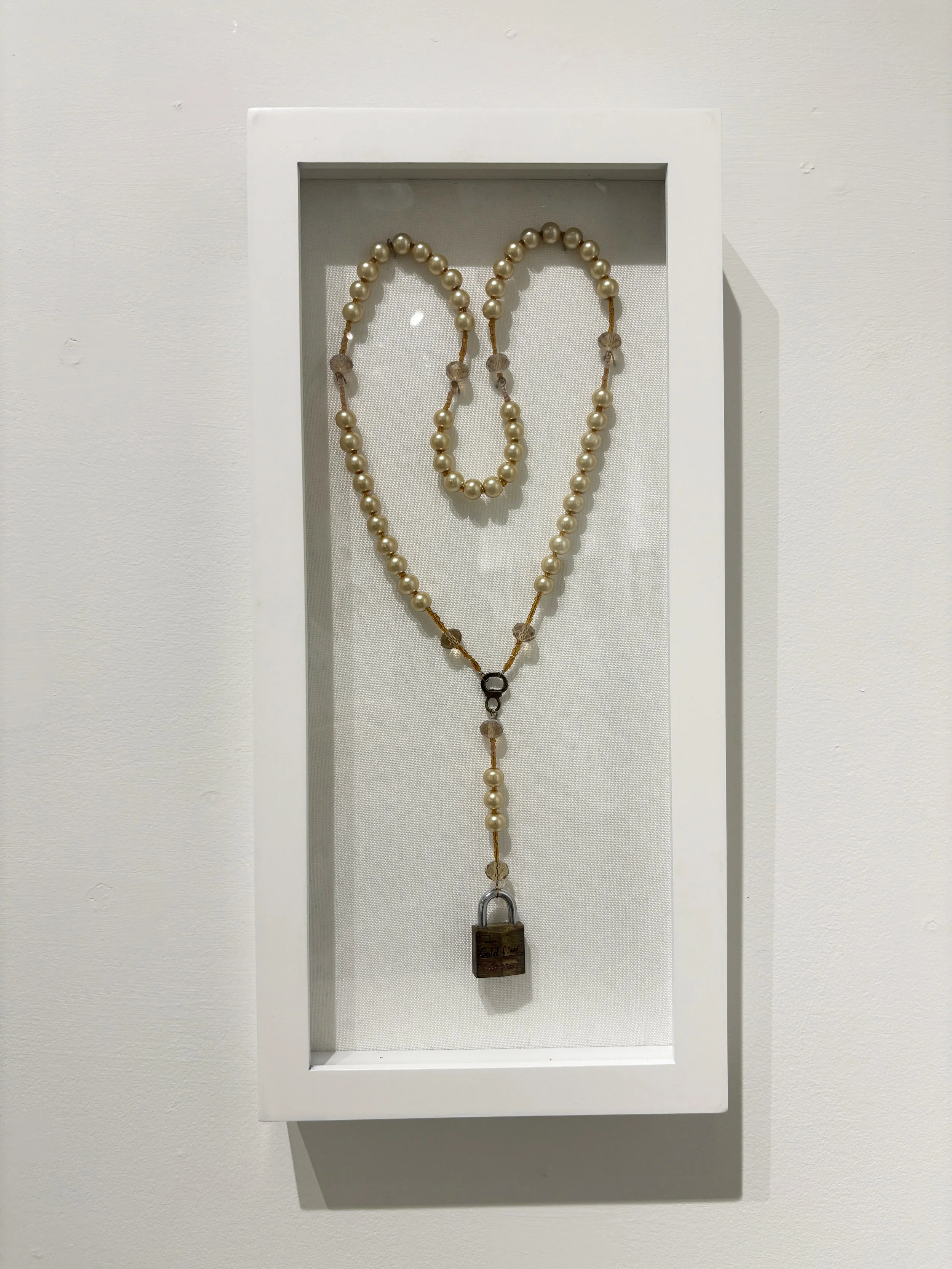 "Locked in Preyer (amber)"
Discarded DIY rosery kit, and lock
$475.