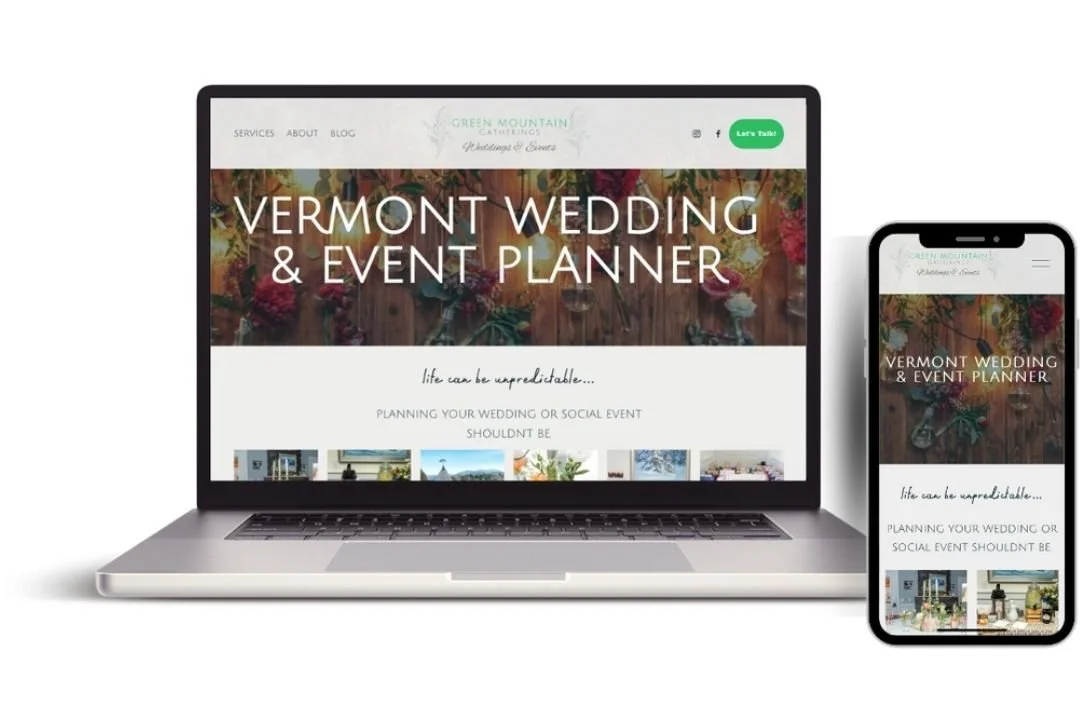 Laptop and smartphone displaying a website for Vermont wedding and event planning called Green Mountain Caterings with a rustic wooden background and floral decorations.