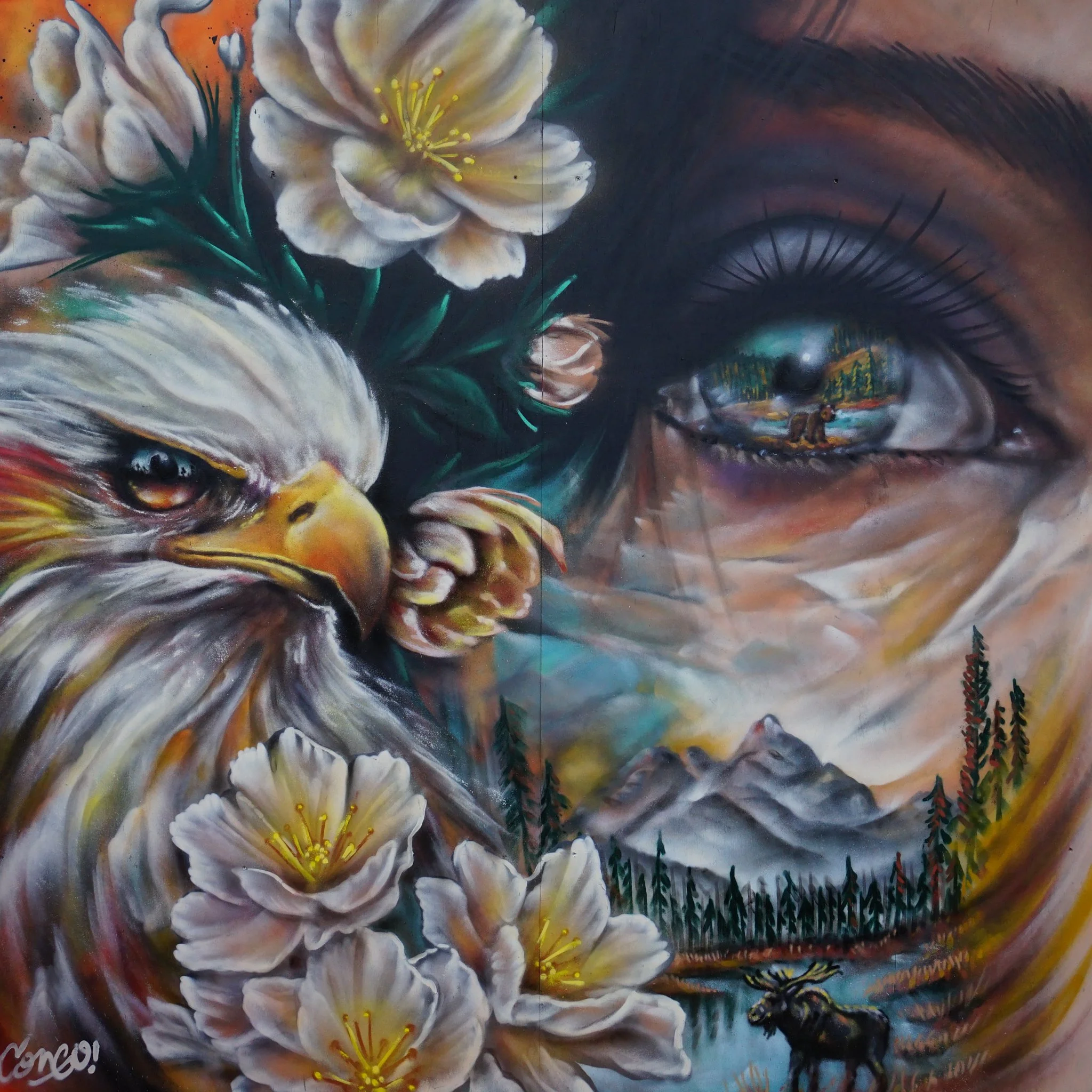 Mural of women, eagle and moose