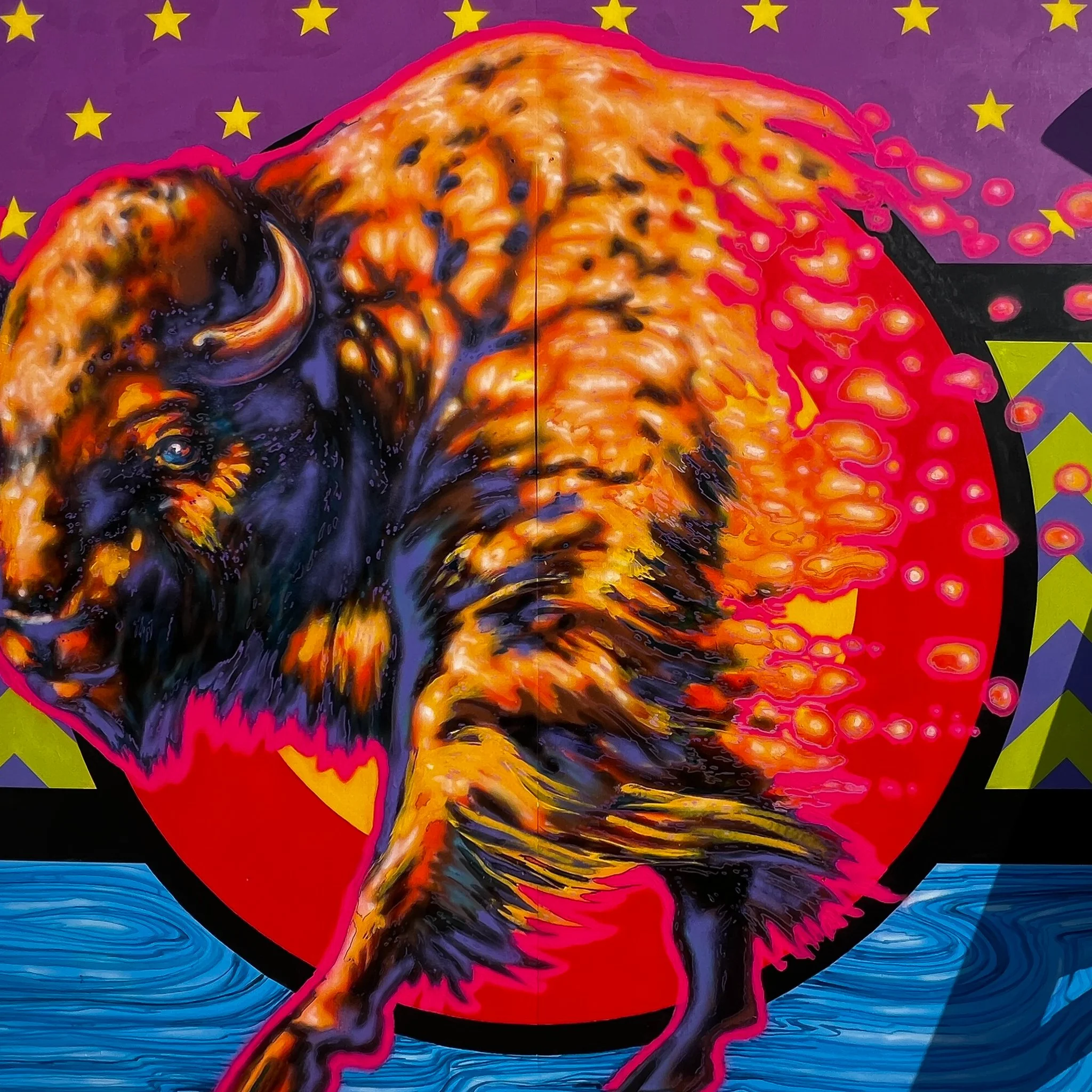 A colorful, abstract portrait of a person's profile with swirling backgrounds of blue and red, and a backdrop of purple with yellow stars. The face is orange and yellow, with black hair, and outlined in pink.