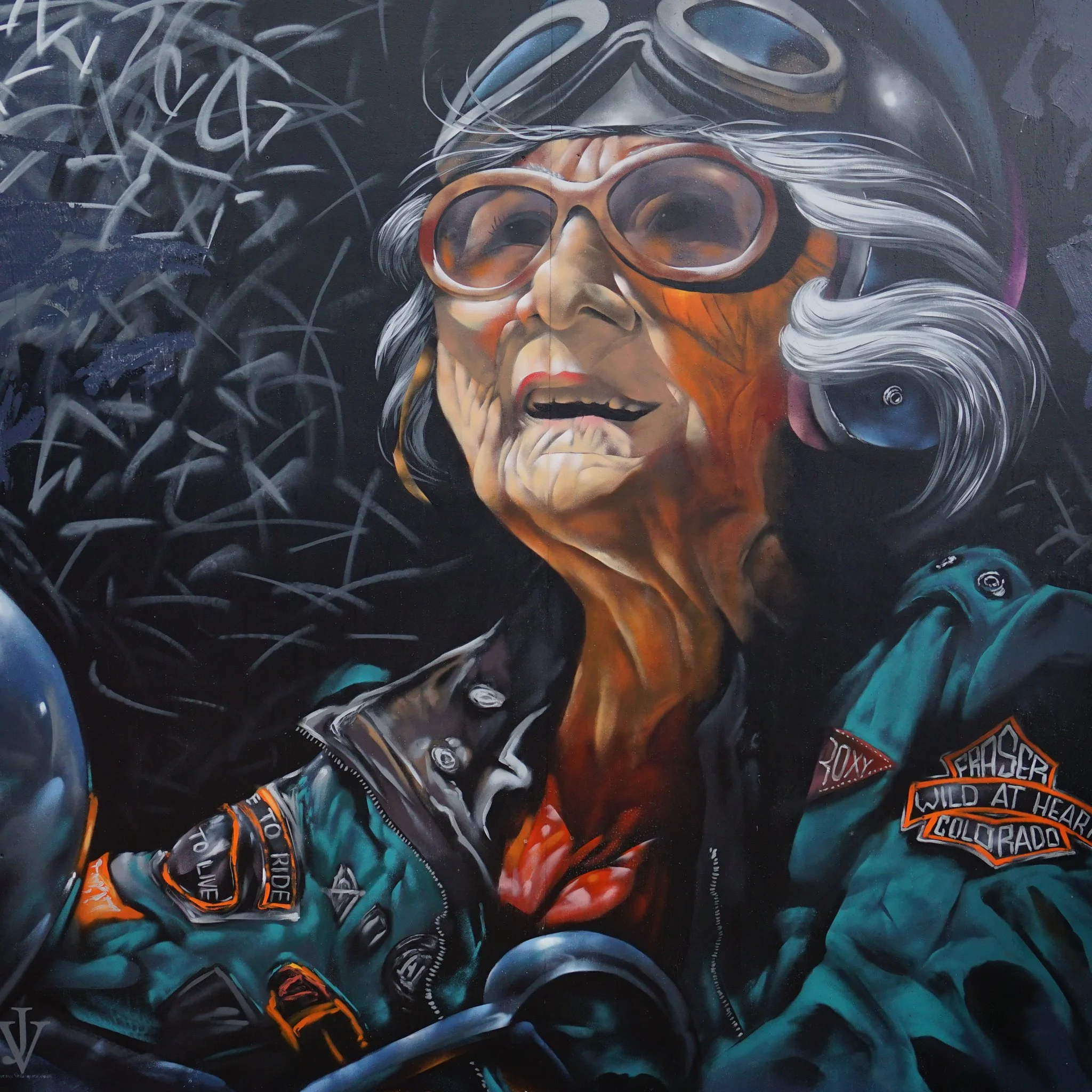 Painting of old biker woman