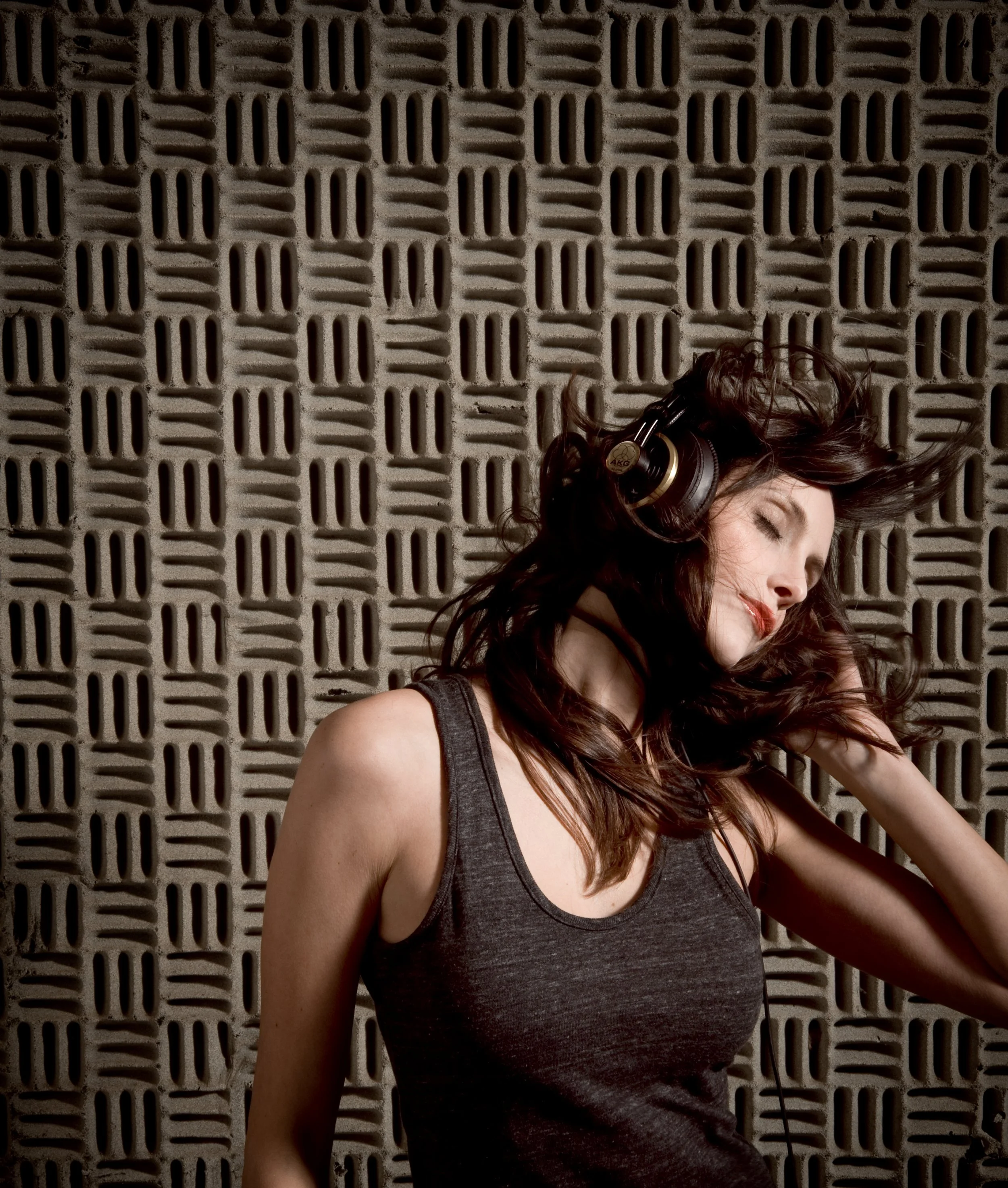 tara quimby dancing to music with headphones on for a fashion photo shoot in Burlington vermont