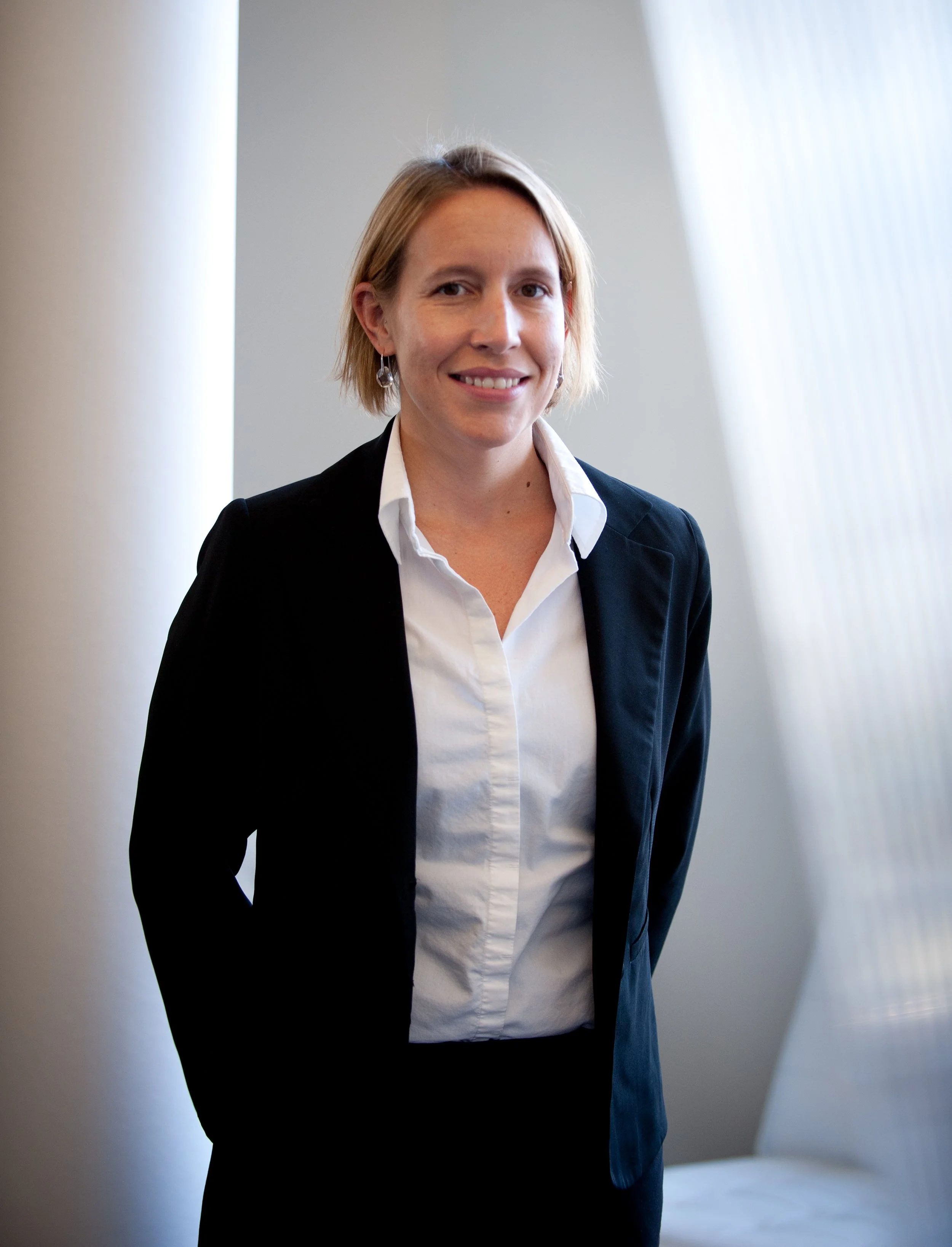 female swarovski lighting employee poses for headshot