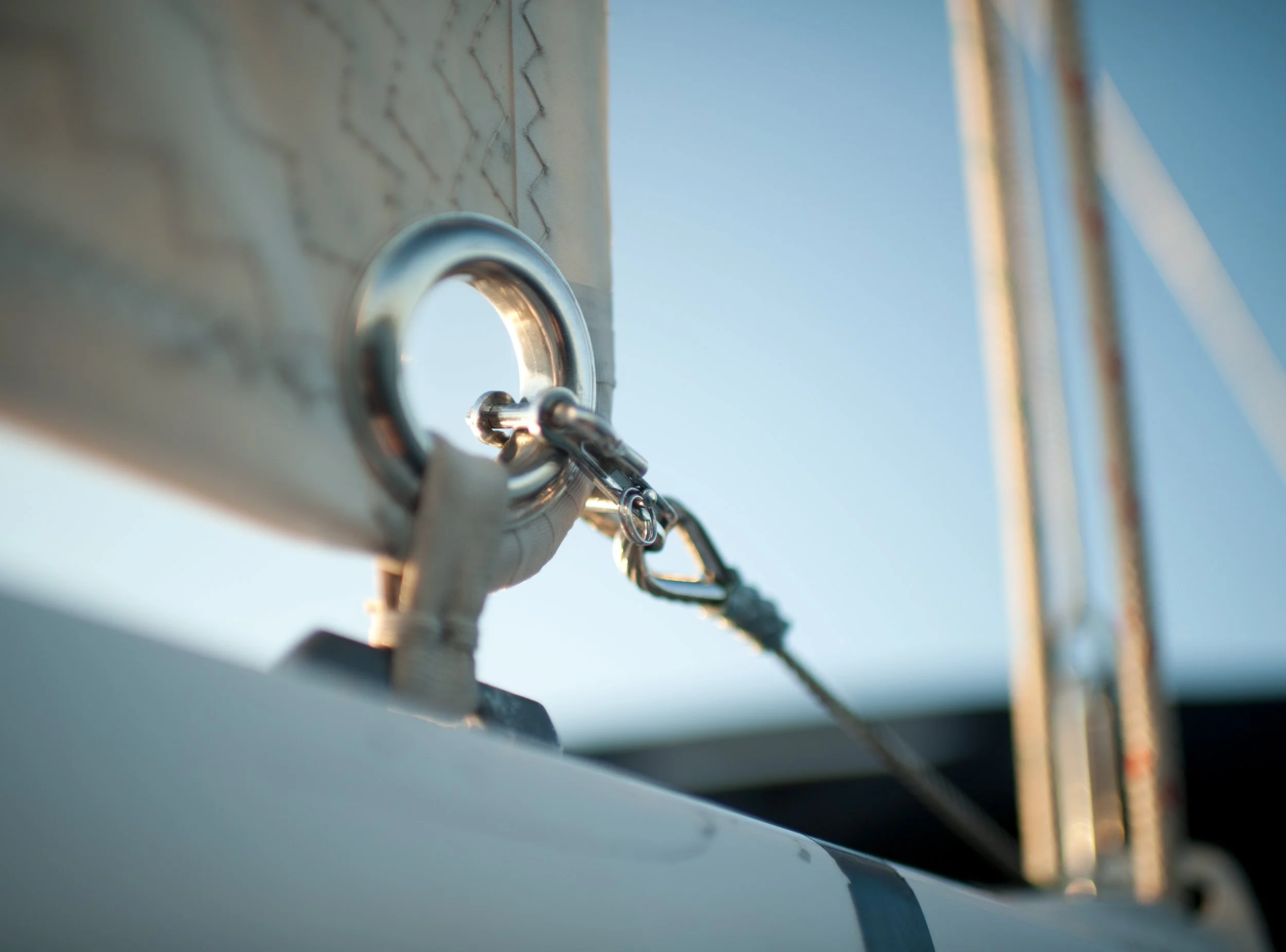 detail photograph of a connection point on a sail of a sailboat