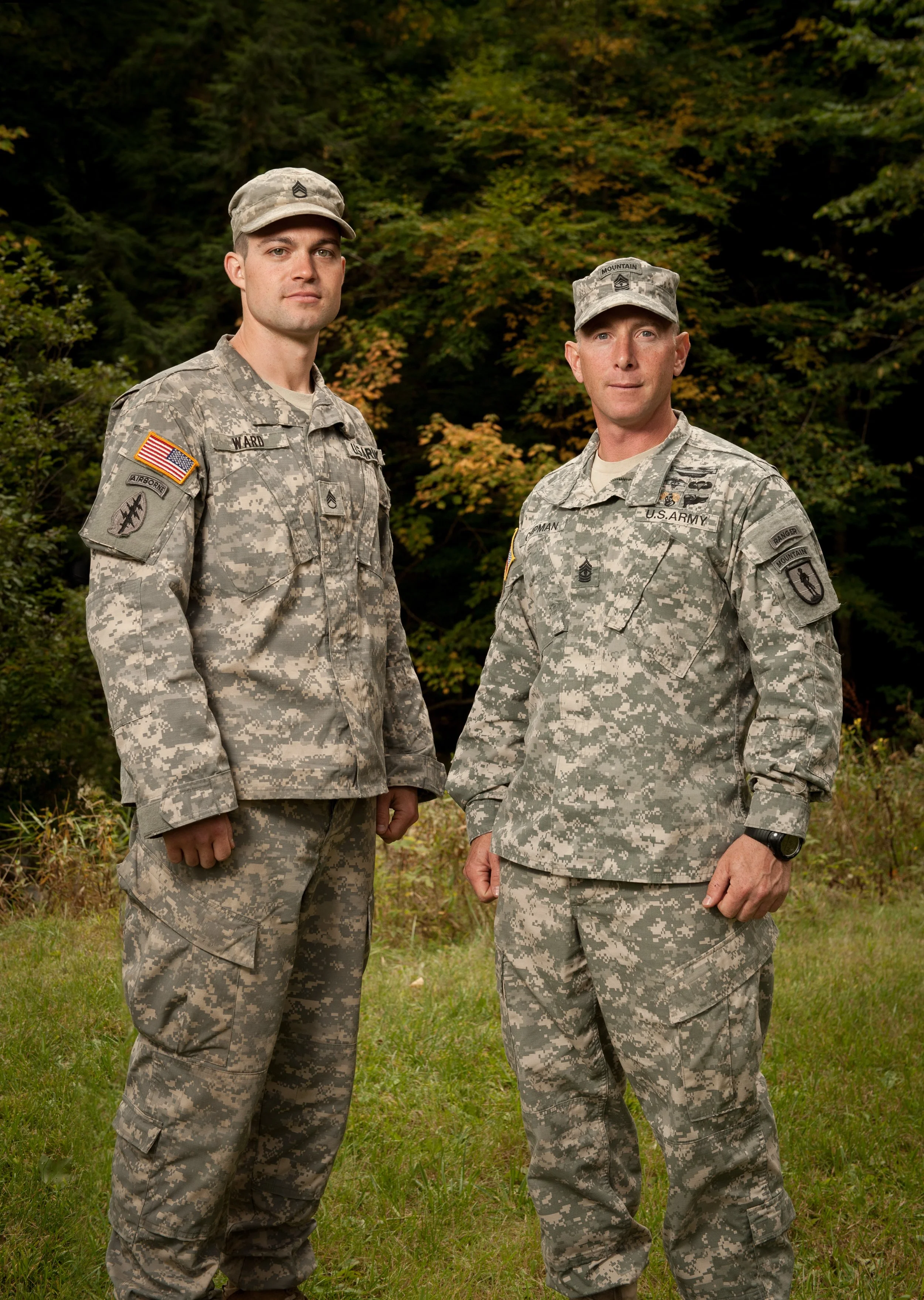two soldiers from the army mountain warfare school in jericho vermont pose for a portrait