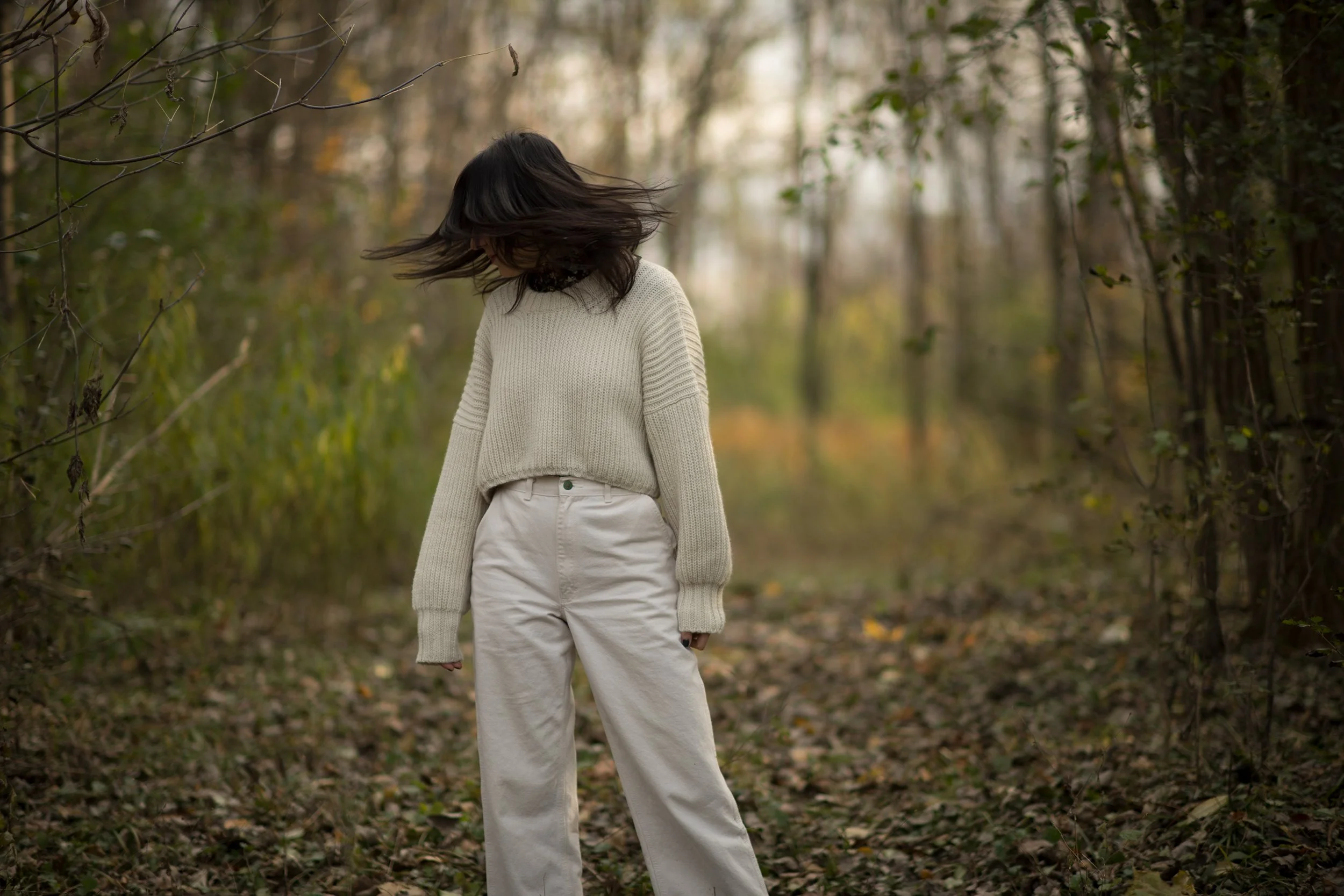 Burlington vermont fashion photographer michael heeney captures amanda richer in white clothing while outdoors