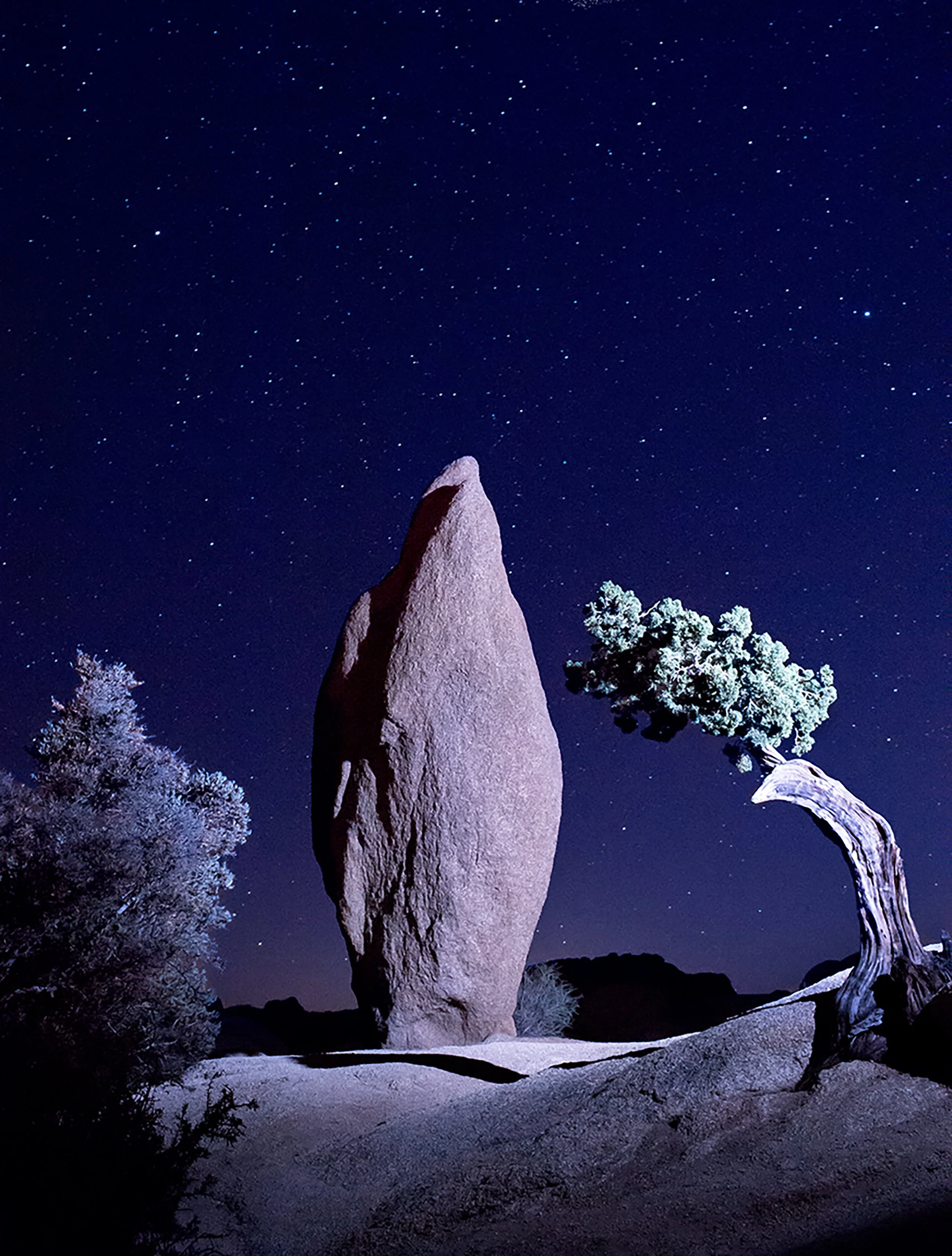 landscape photography night time image of balanced rock in joshua tree california