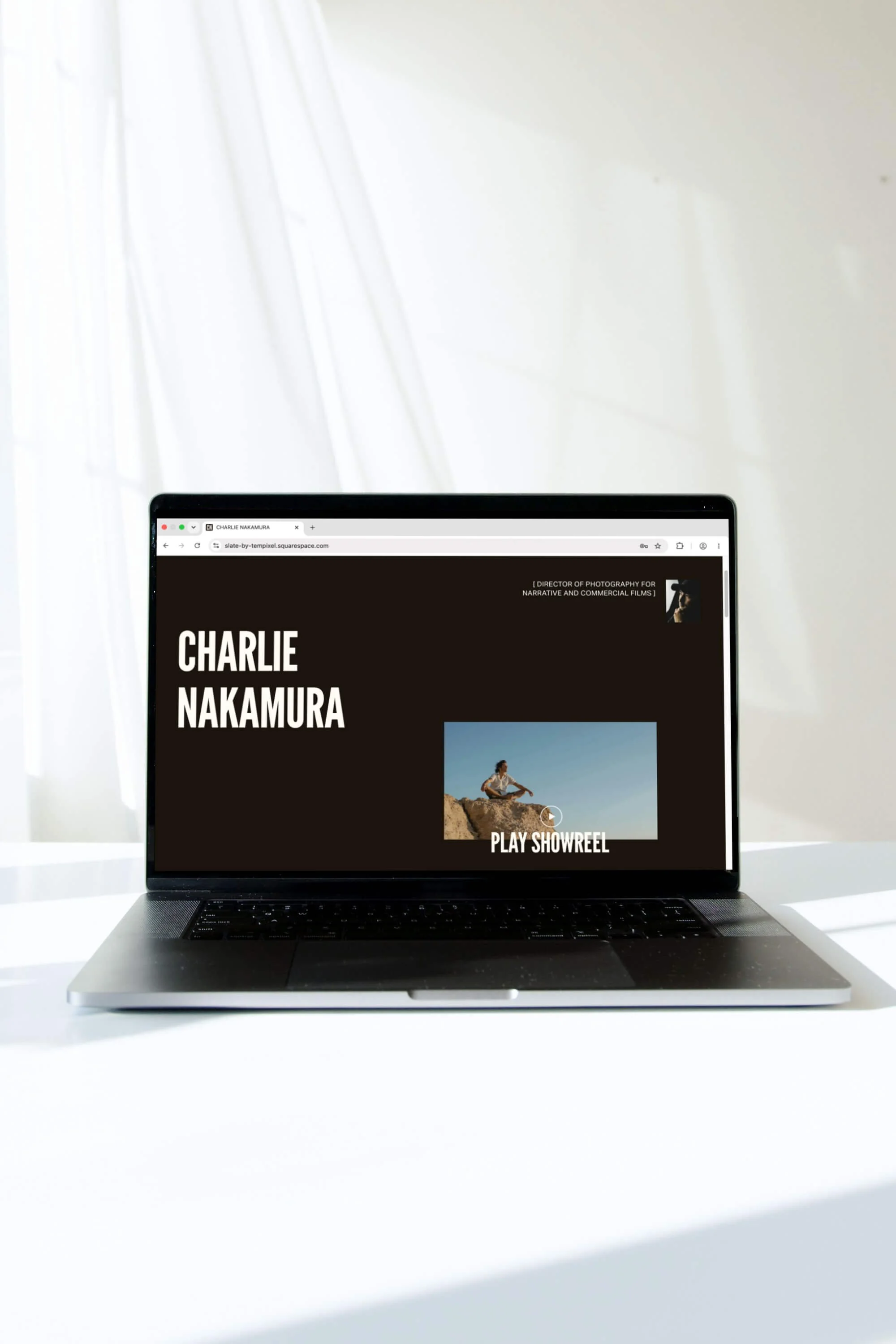 Slate macbook mockup homepage with showreel-tiny.jpg