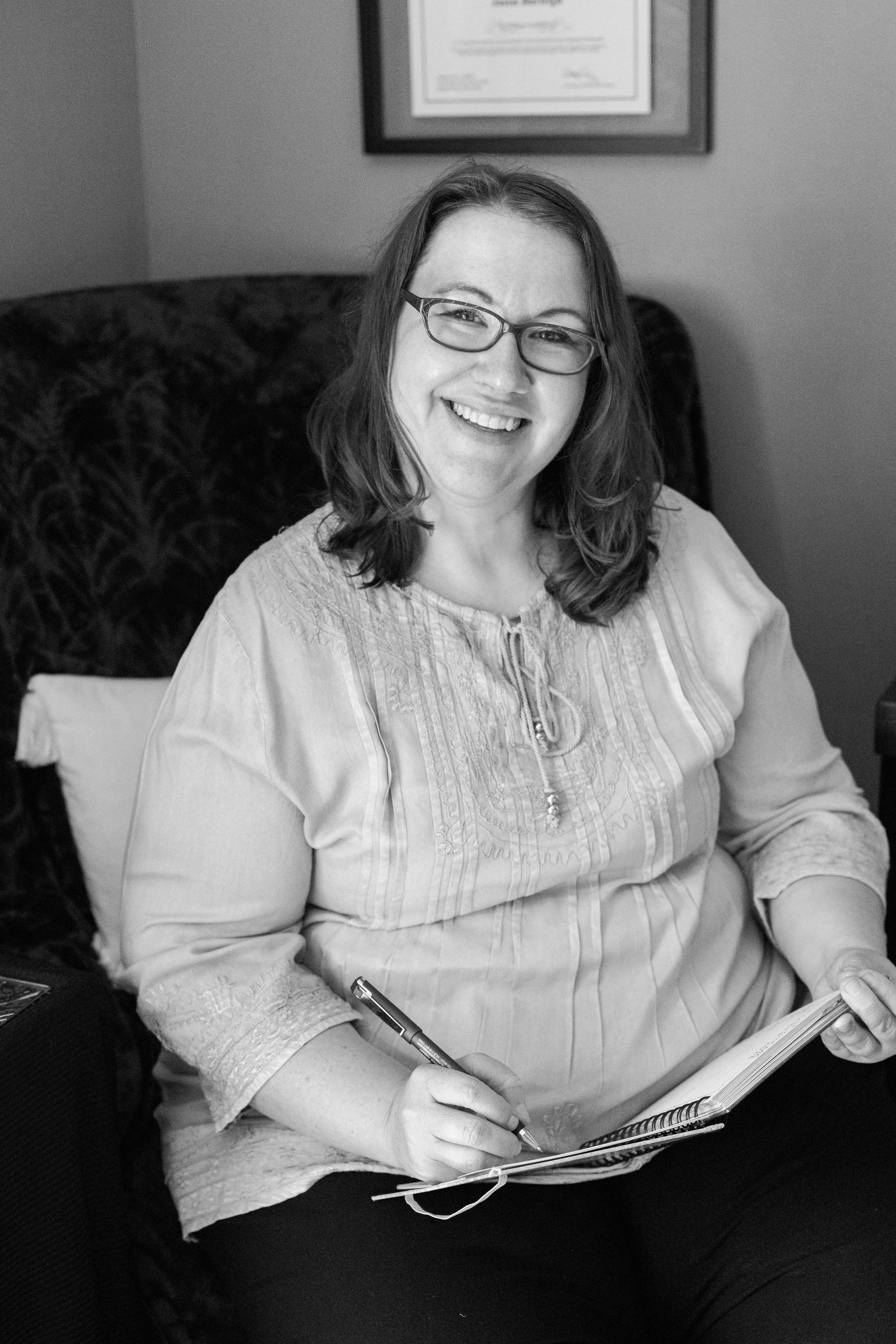 McKenzie Lee Burleigh, LMT schedules her clients in her datebook