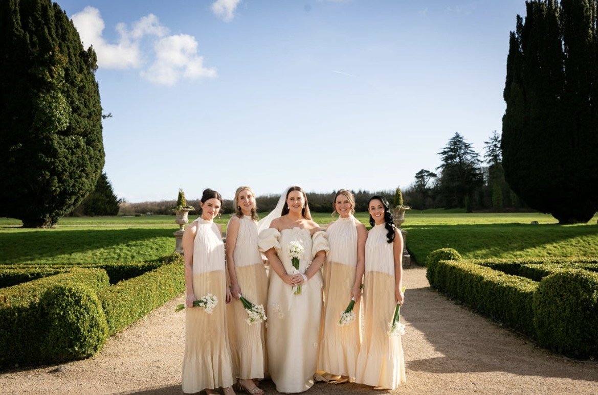 Caroline and her bridesmaids carrying bouquets of Paperwhite Narcissi at Castlemartyr Estate. Image by Jenny McCarthy
