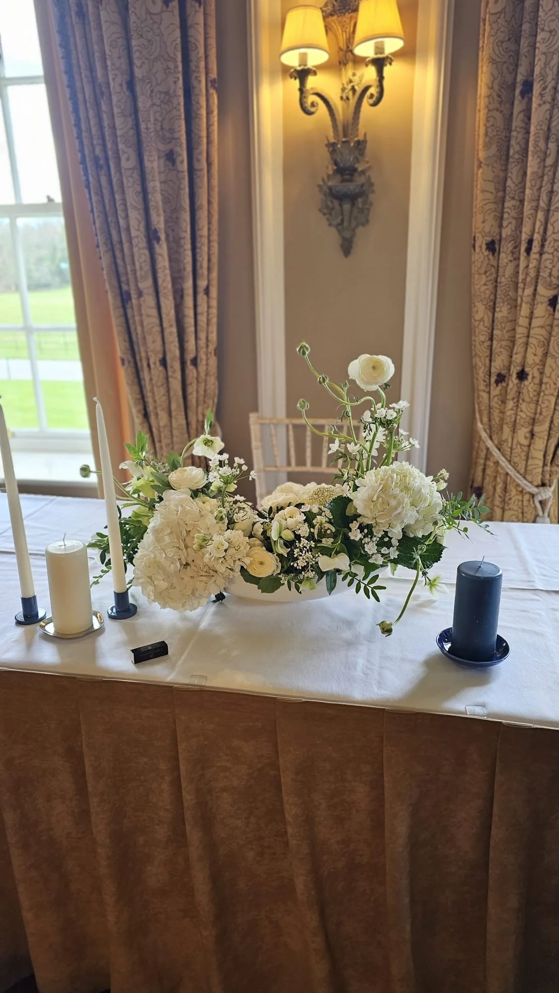 Ceremony table flowers in The Kiltha Room, Castlemartyr Estate.