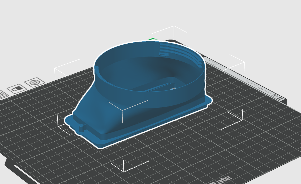3D model of a blue 3D printed part fan housing on a black grid work surface.