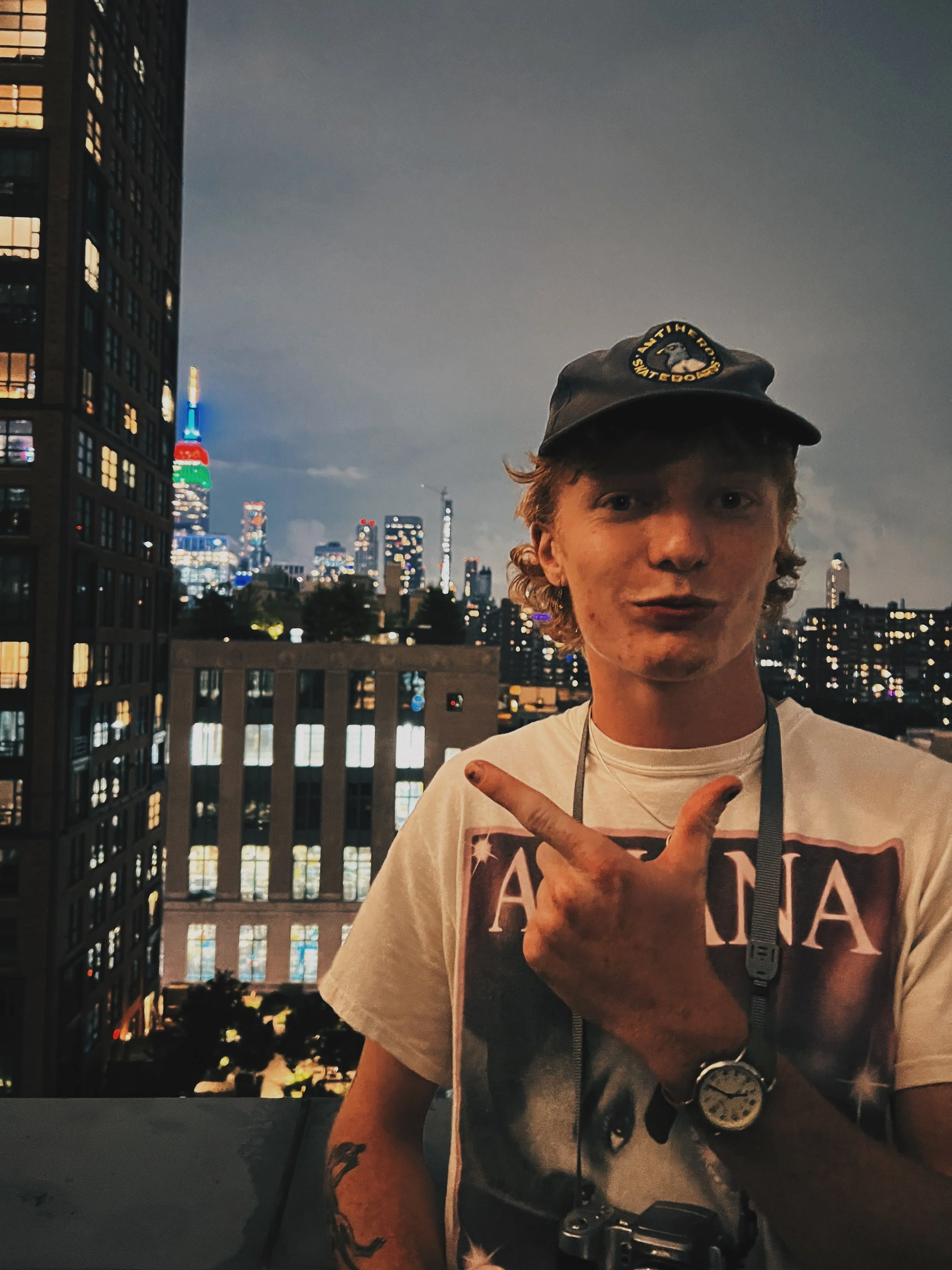 Mccrae Wester in New York City. Standing in front of the Empire State Building. By Christopher Clucas.